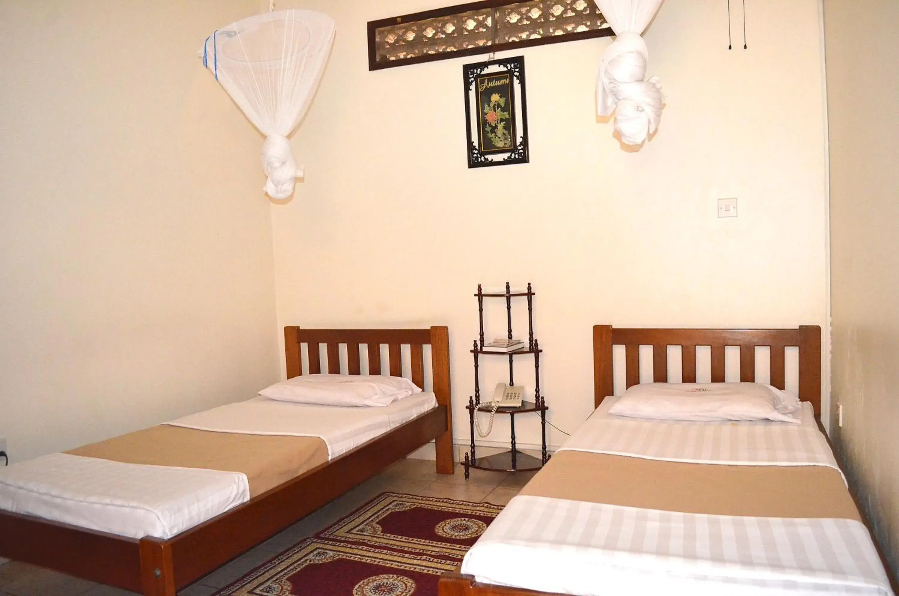 Standard Twin Room in Victoria Travel Hotel Standard Twin Room in Victoria Travel Hotel