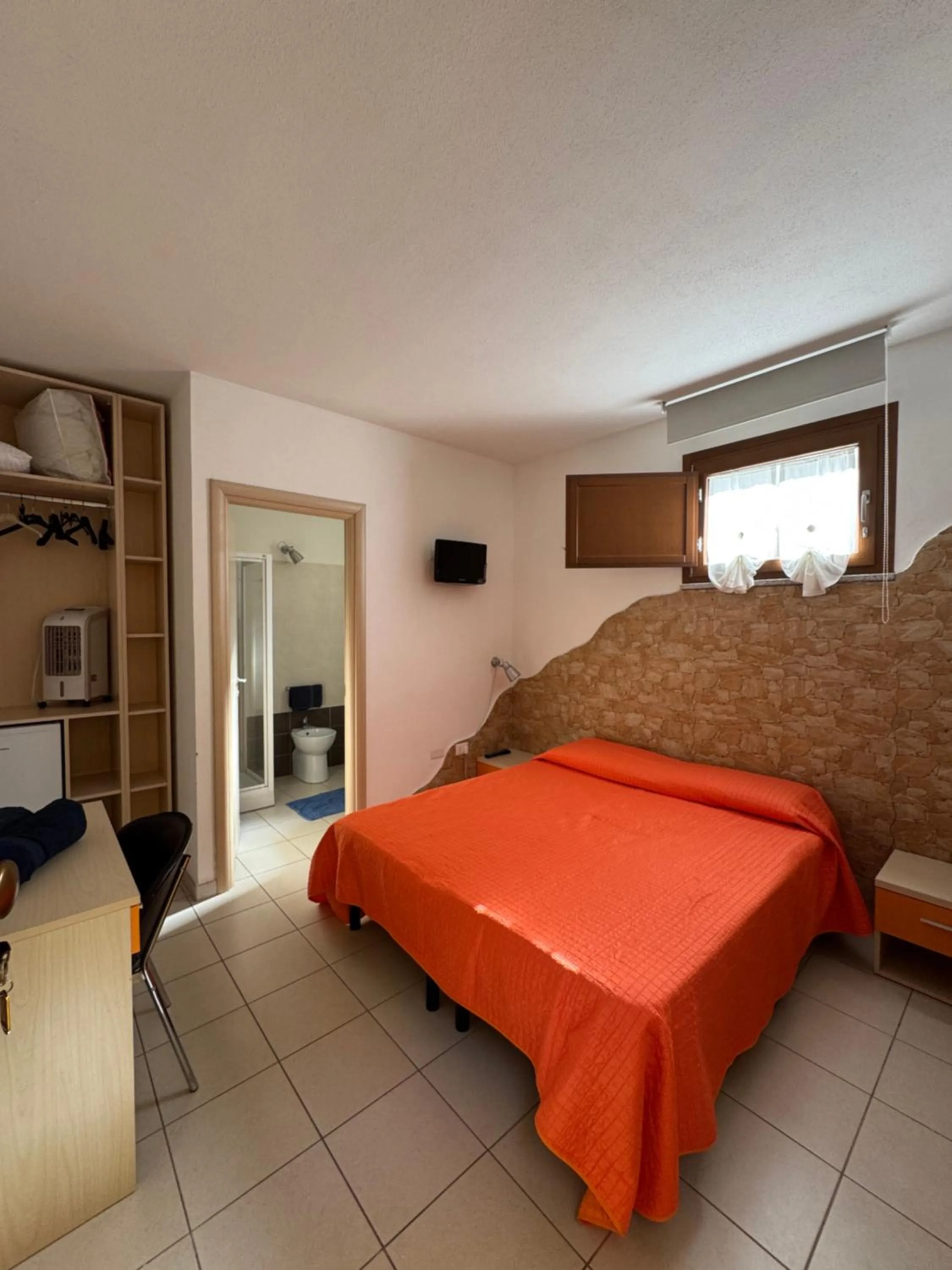 Bedroom in Sa Mamma e Sole B&B