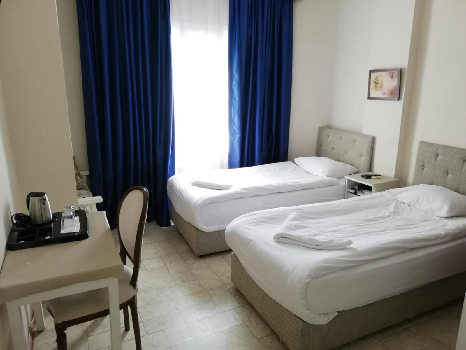 Photo of the whole room, Bed in Urkmez Hotel