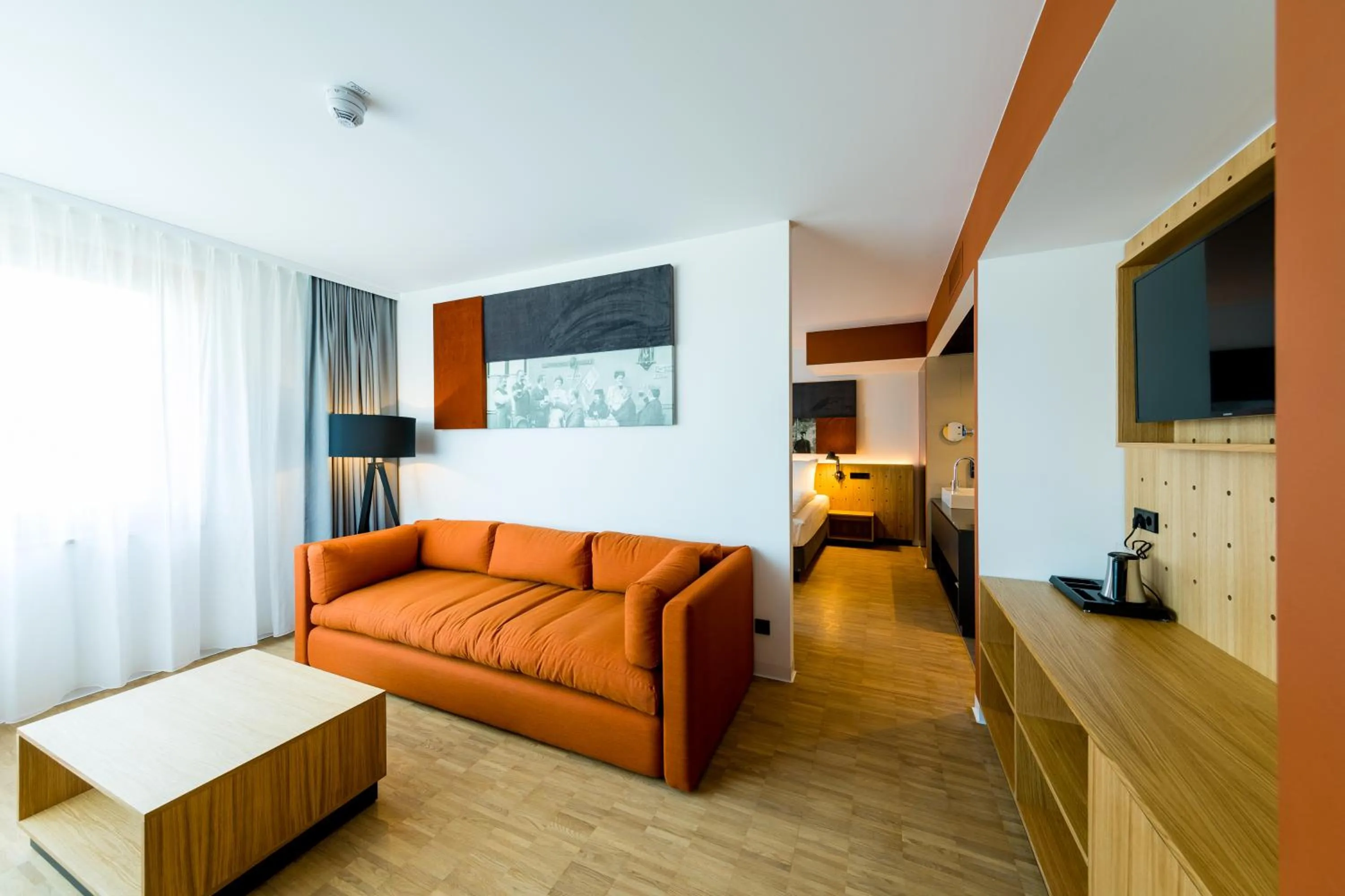 Living room, Bed in mk | hotel rüsselsheim