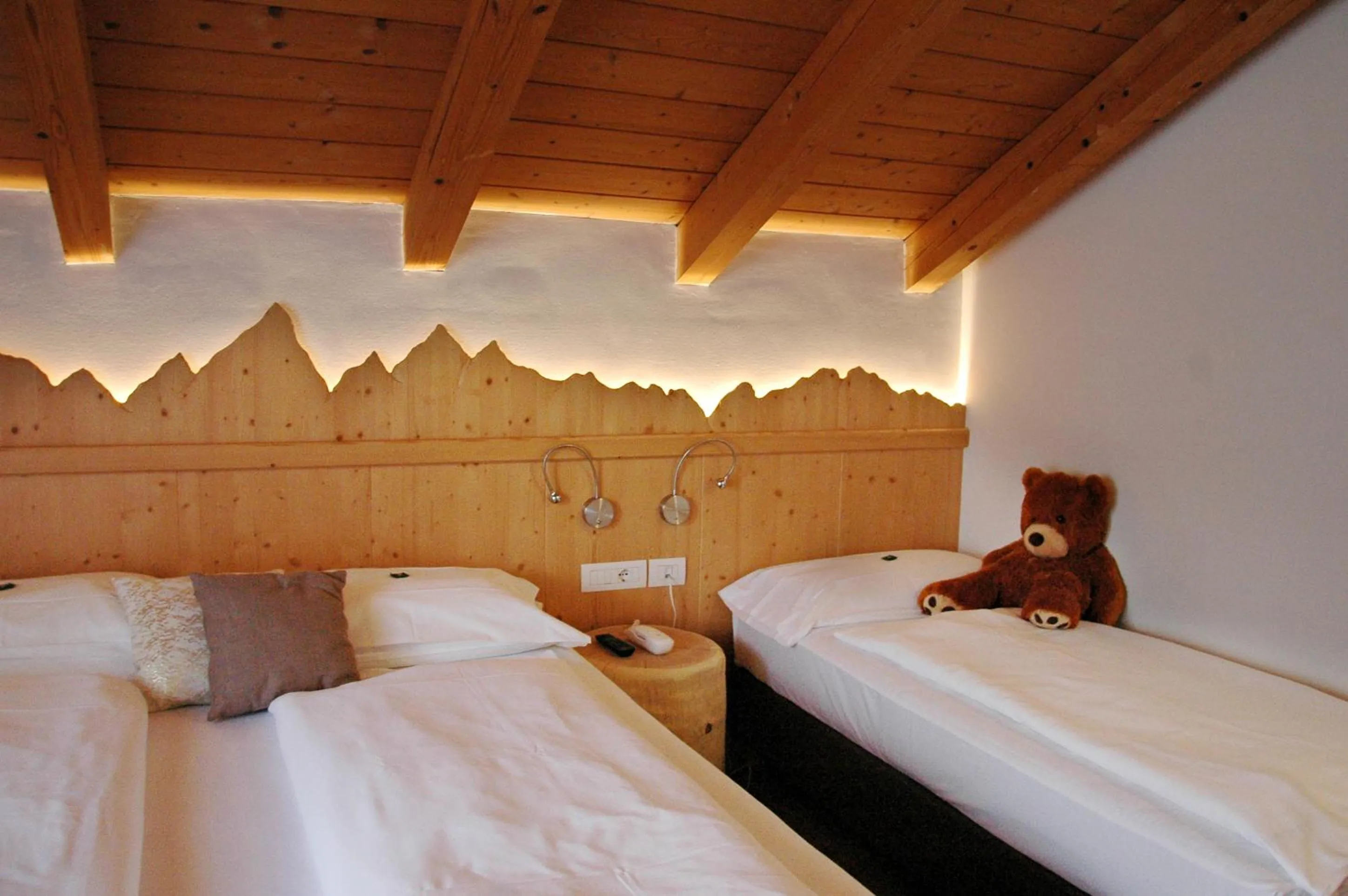 Bed in Olimpionico Hotel