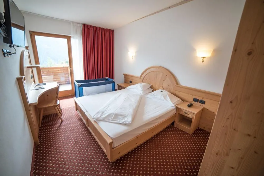 Bed in Olimpionico Hotel