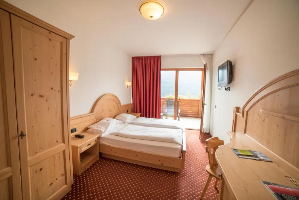 Bed in Olimpionico Hotel