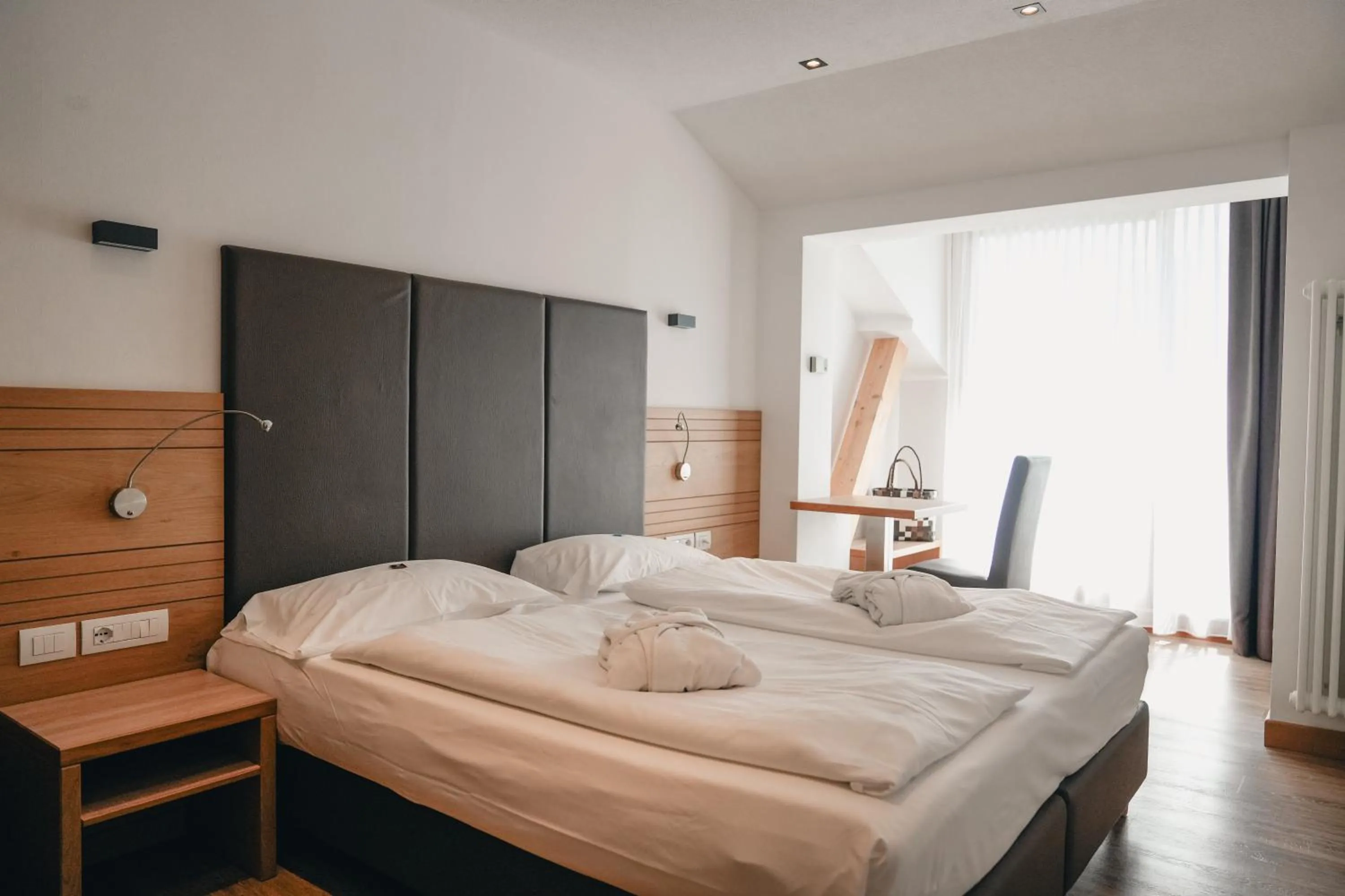 Bed in Olimpionico Hotel