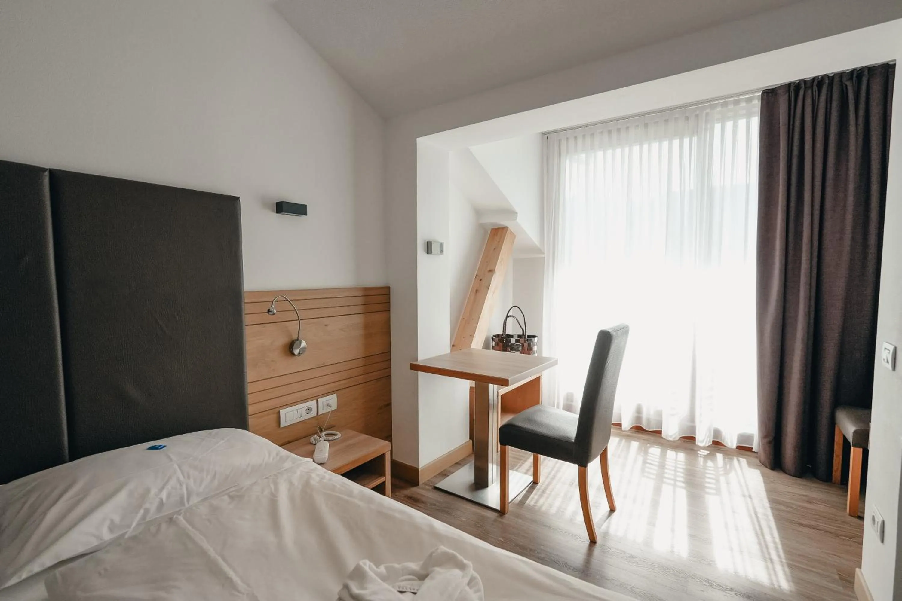 Bed in Olimpionico Hotel