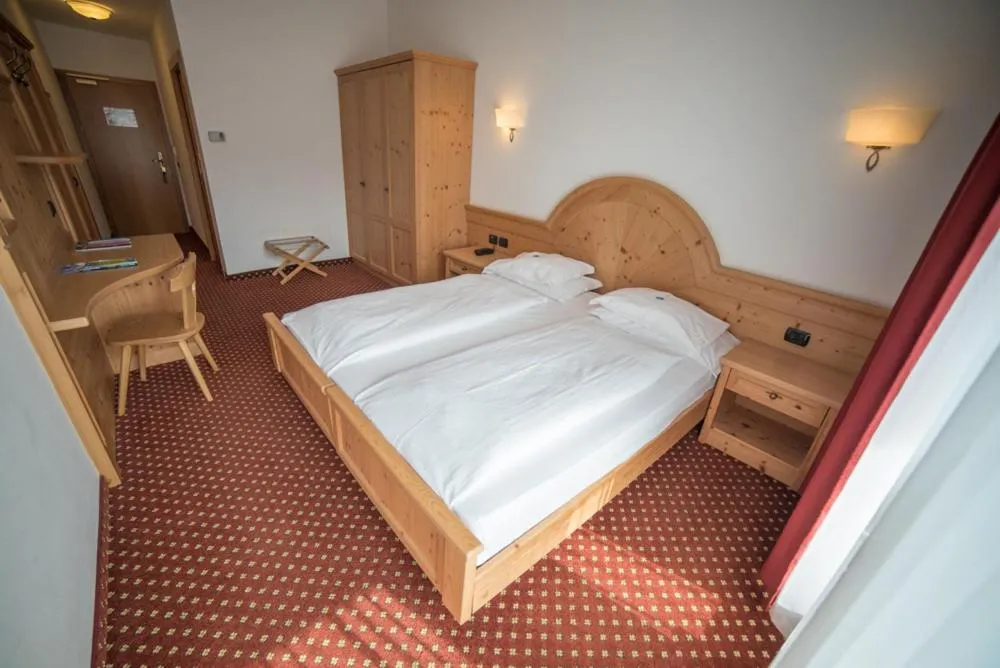 Bed in Olimpionico Hotel