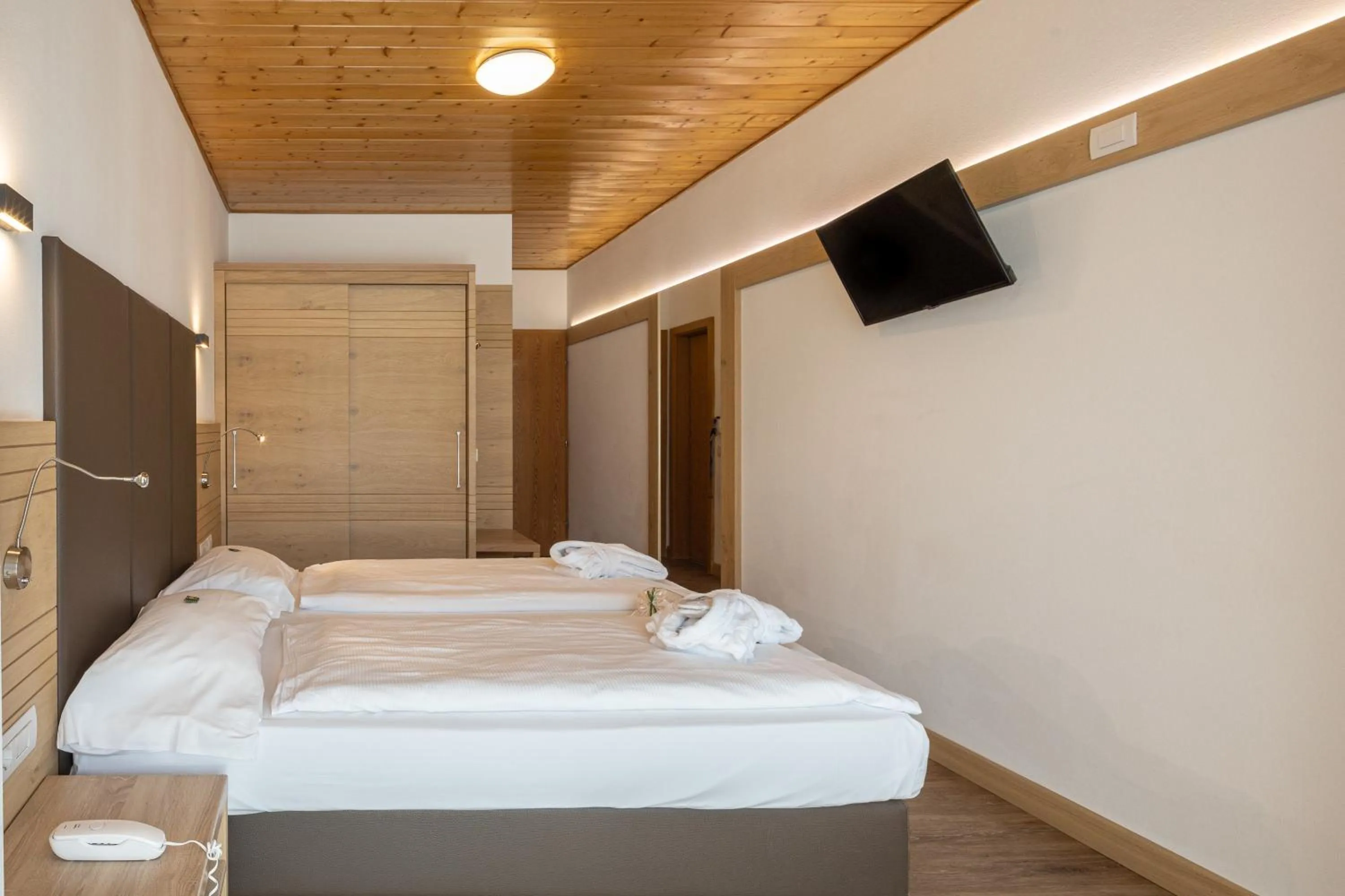 Bed in Olimpionico Hotel