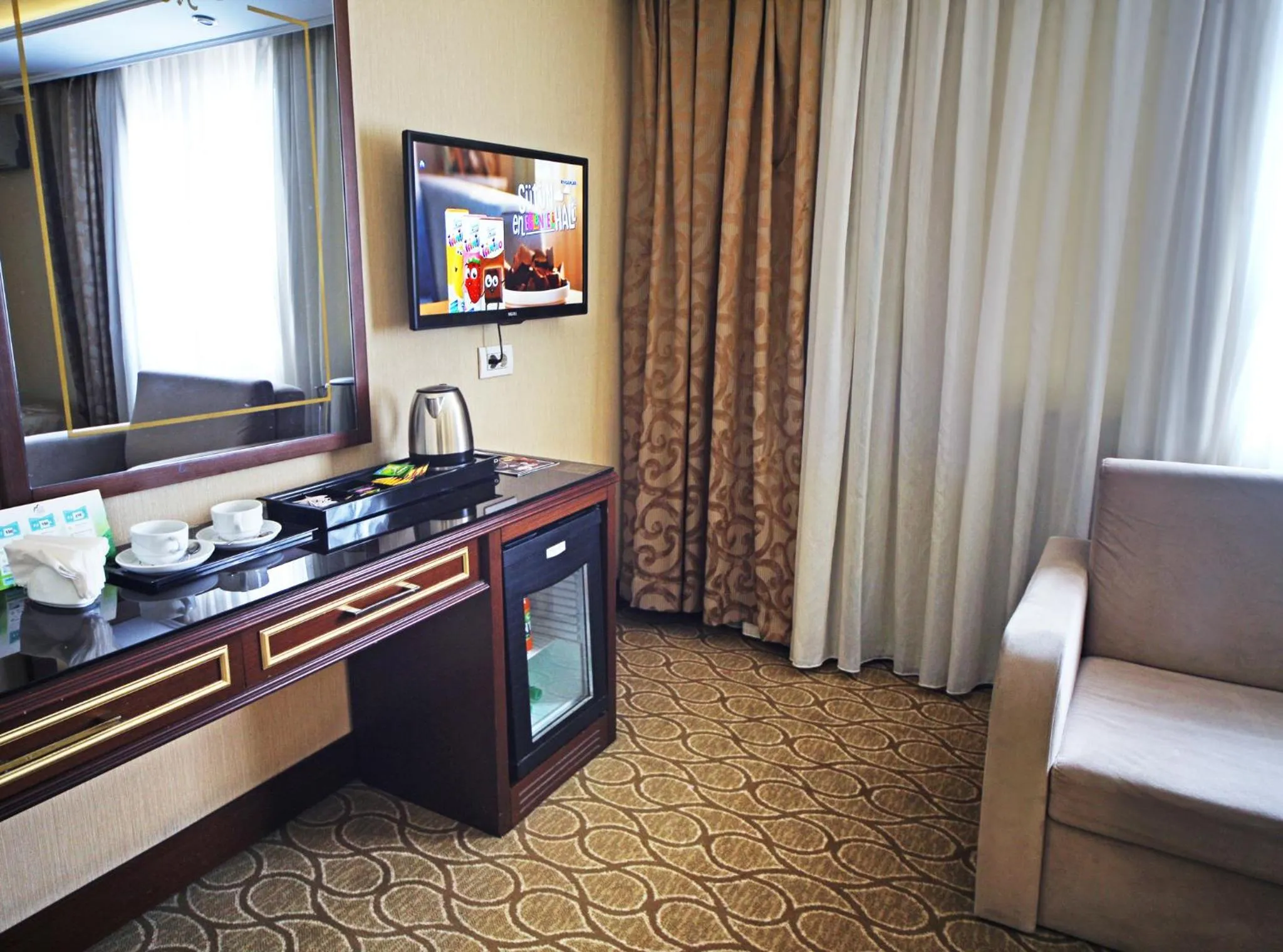 Communal lounge/ TV room in The Parma Hotel Downtown