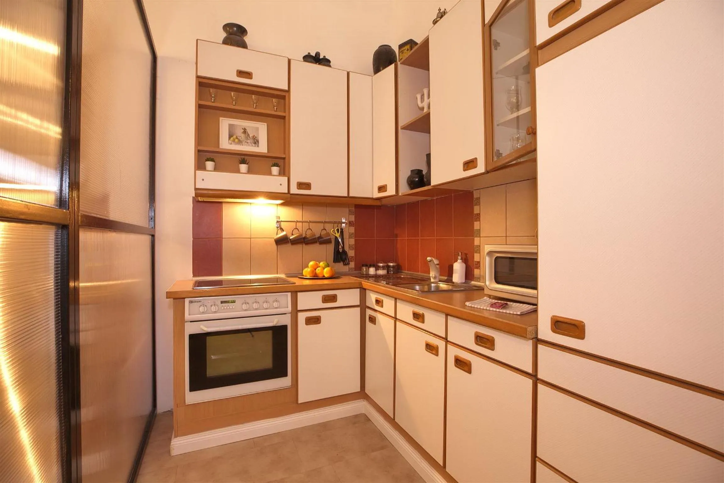 Kitchen or kitchenette in Kahwa Apartments