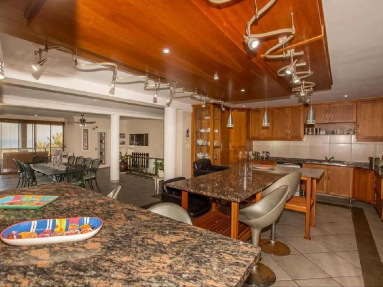 Communal lounge/ TV room in At Doms B&B