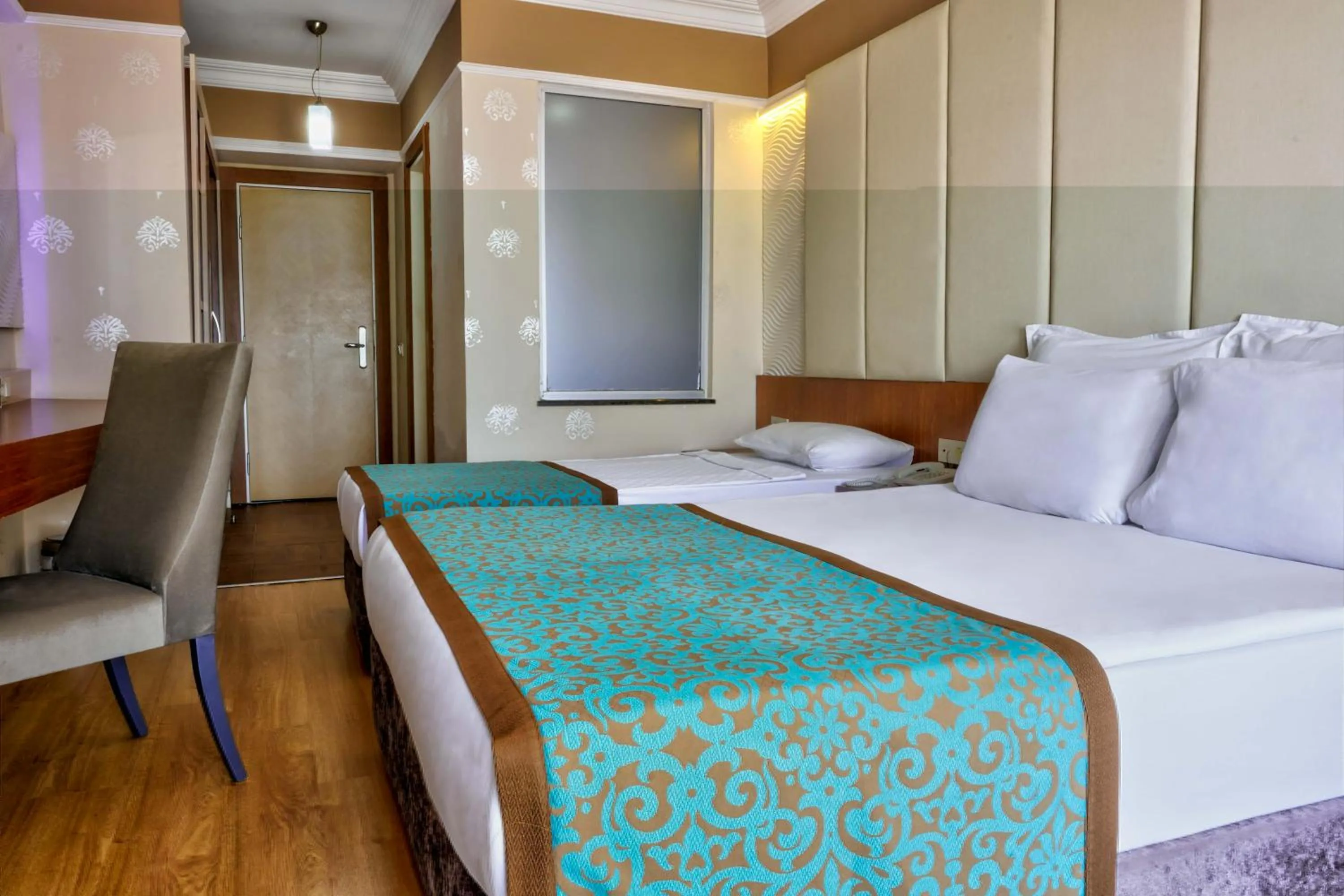 Bed in Tac Premier Hotel & Spa