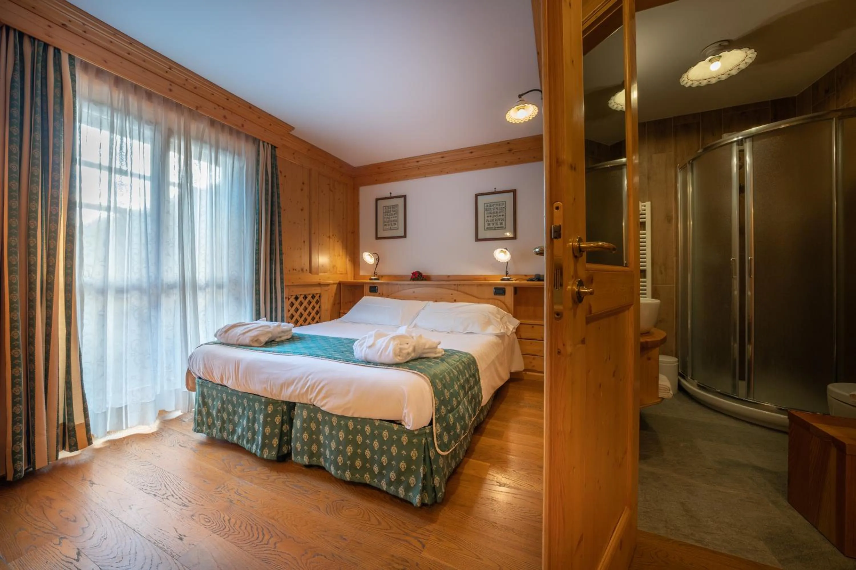 Bed in Lo Scoiattolo Hotel