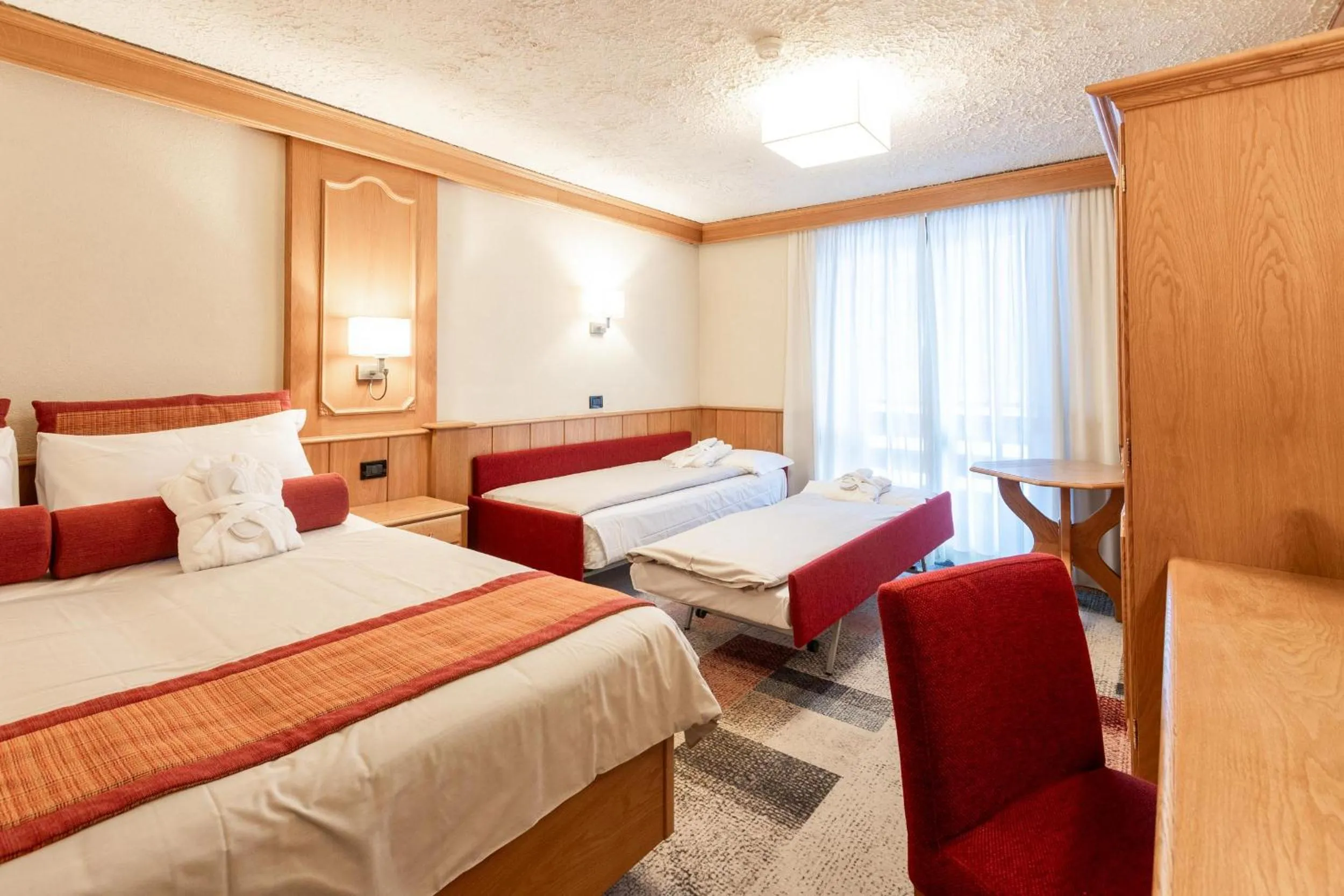 Bed in Hotel Intermonti