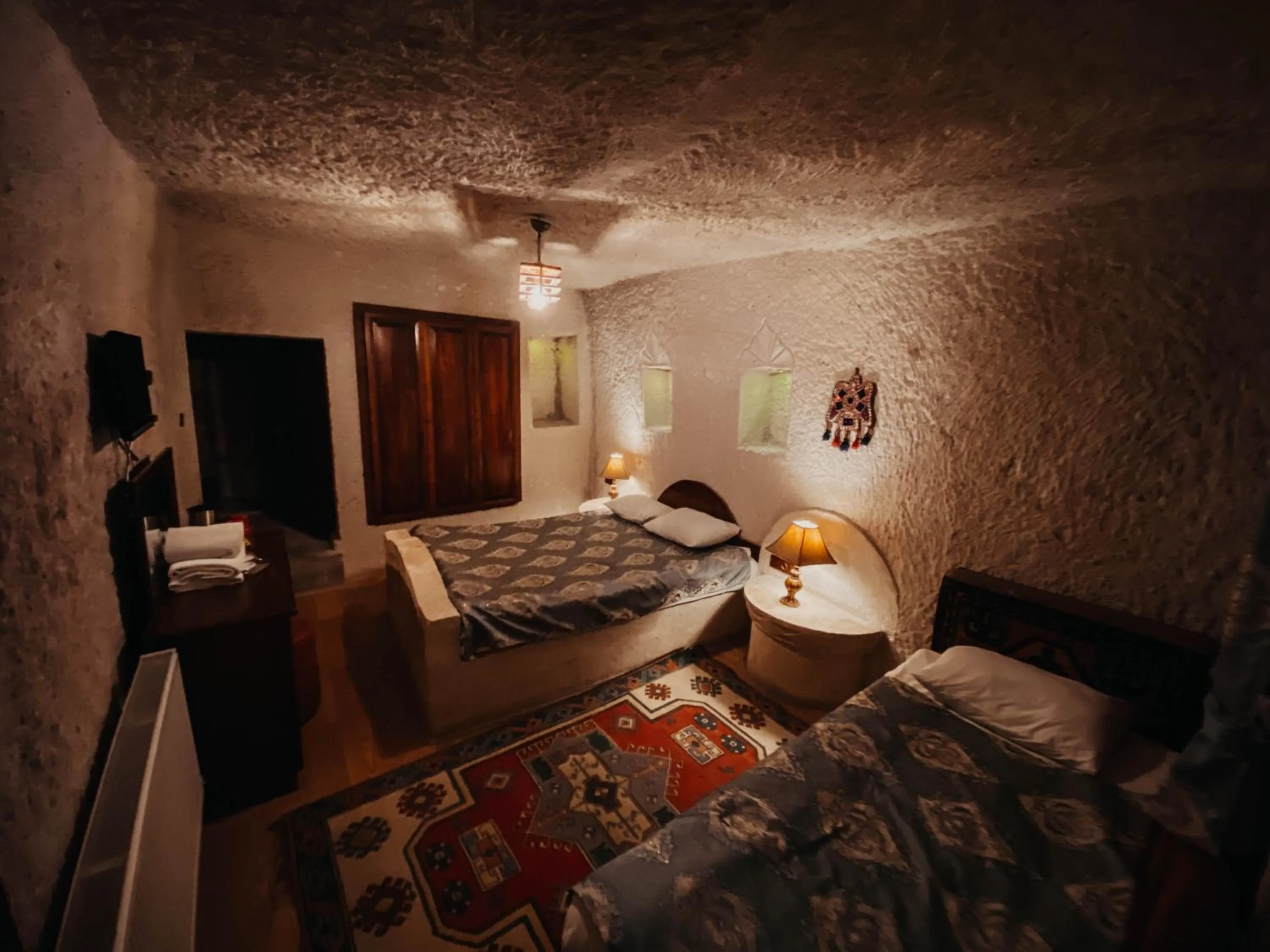 Bed in Asteria Cave Hotel