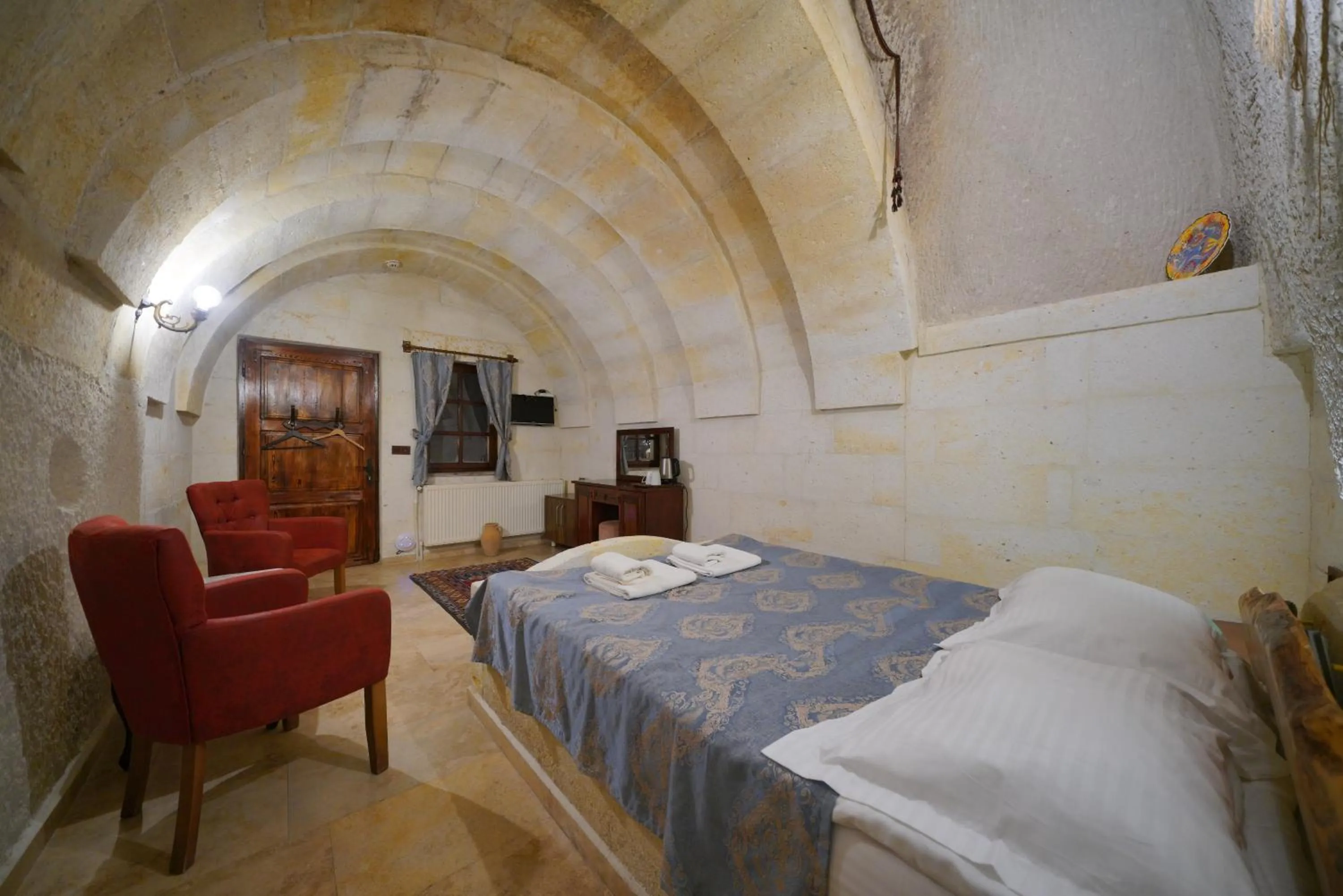 Bed in Asteria Cave Hotel