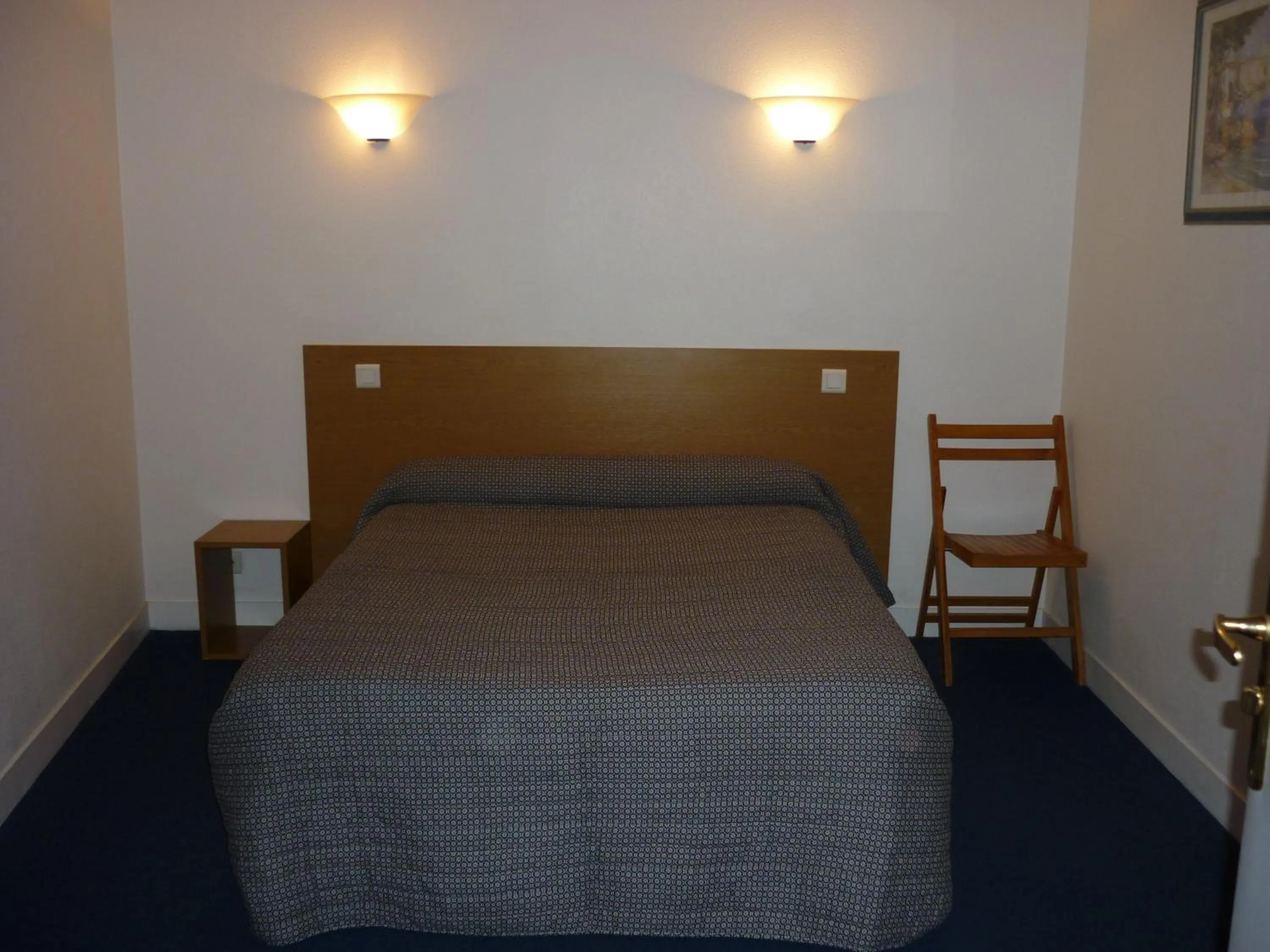 Bed in Hotel Neptune