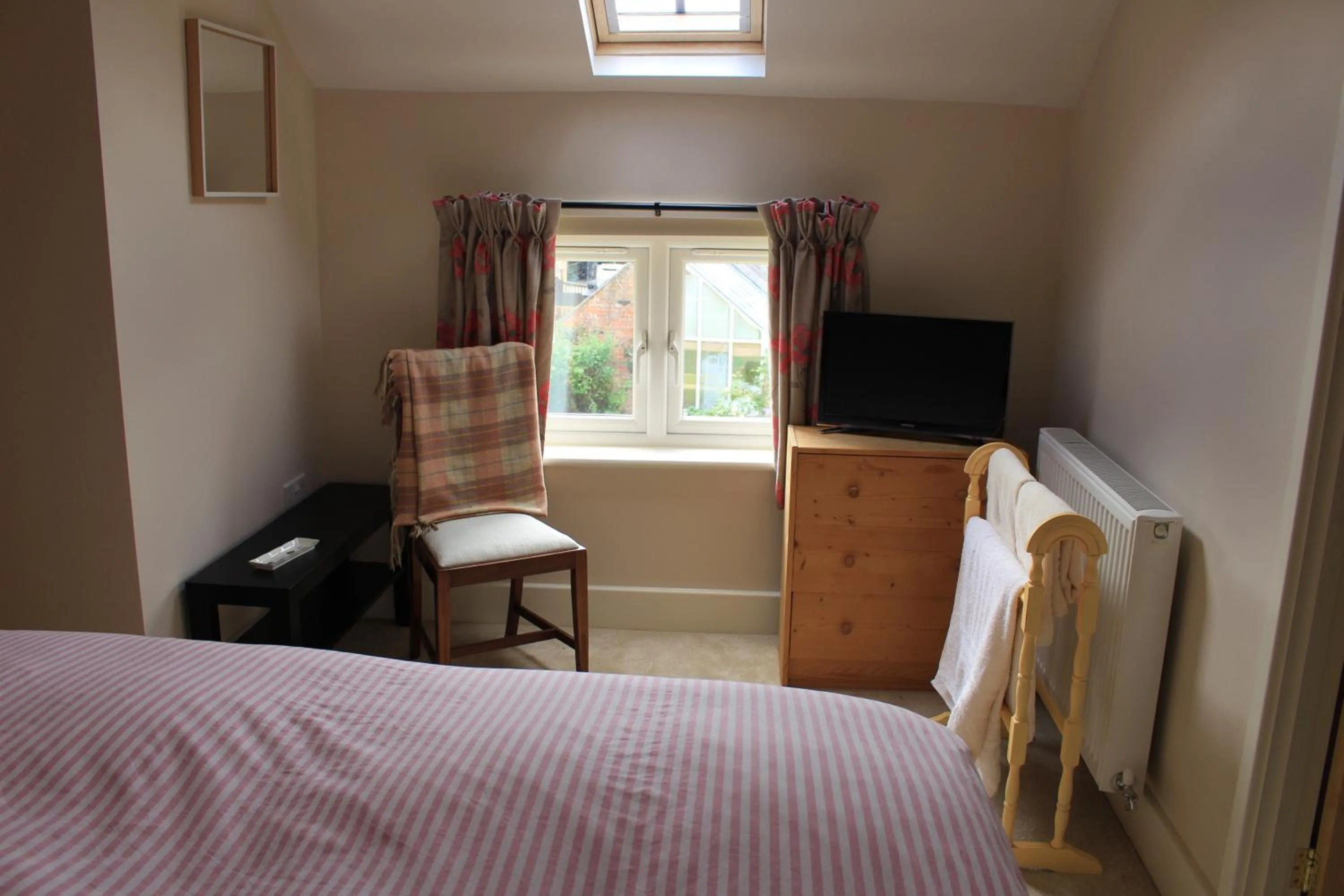 Photo of the whole room, Bed in The Old Bakery Barn