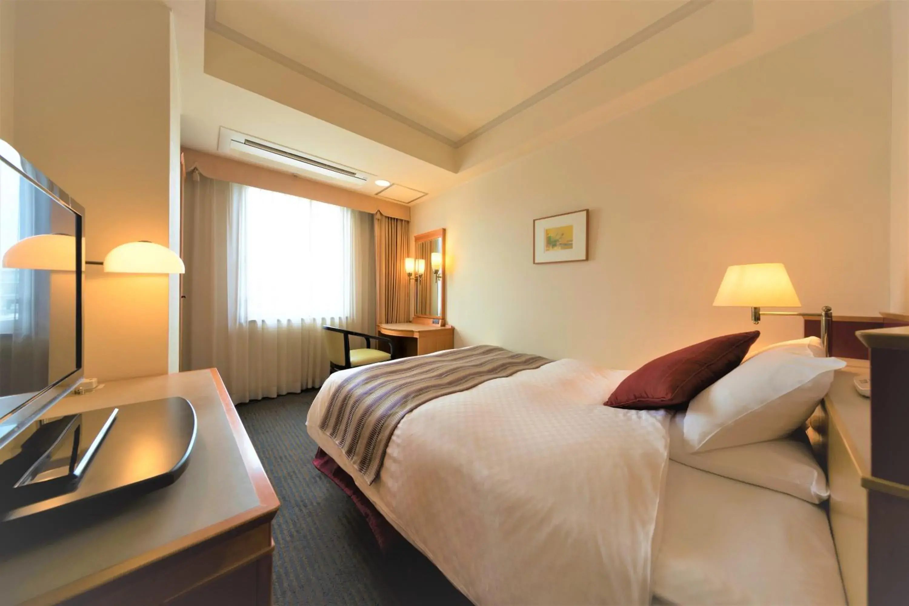 Bed in KKR Hotel Kumamoto Bed in KKR Hotel Kumamoto