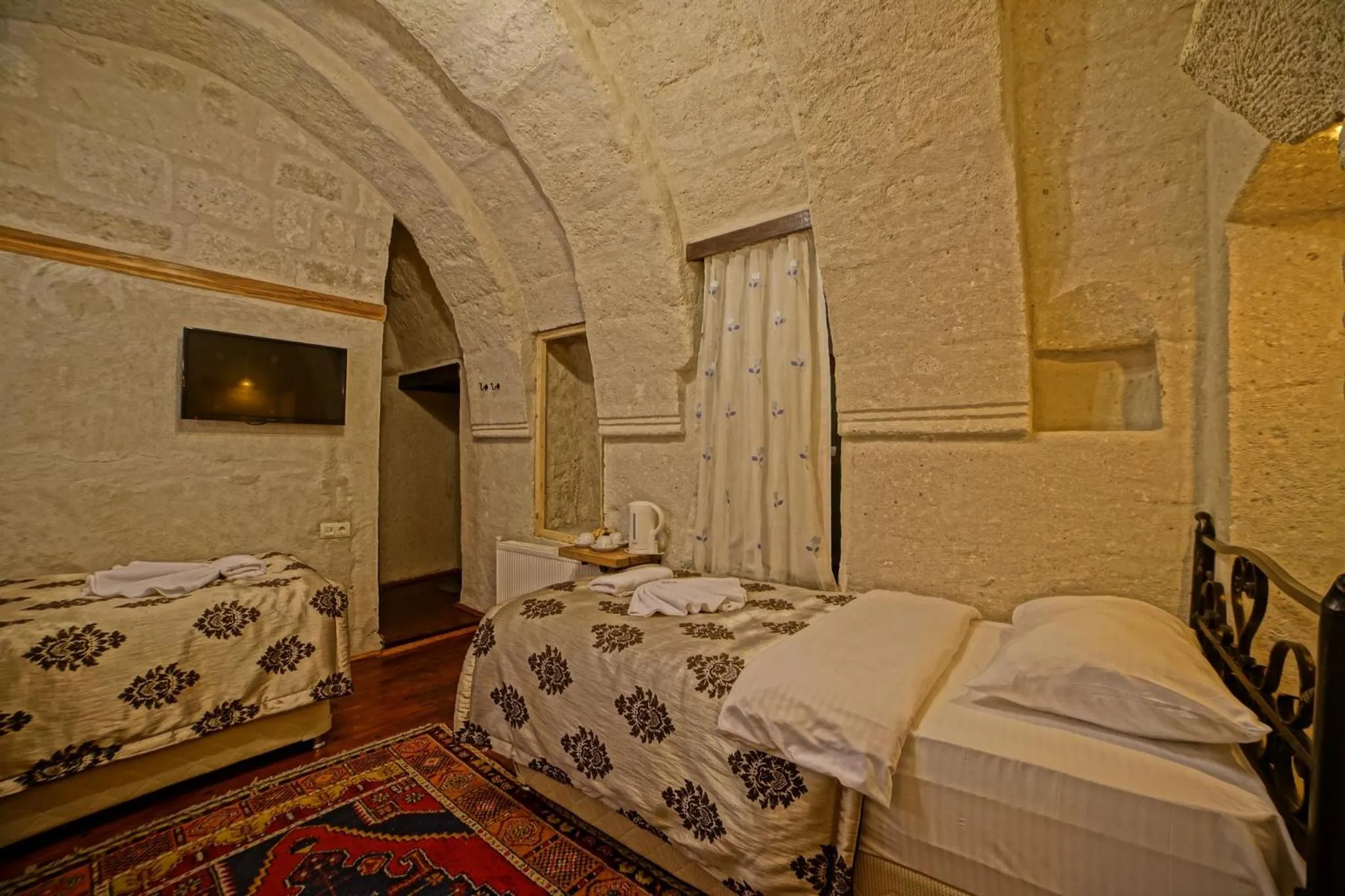 Bed in Melek Cave Hotel
