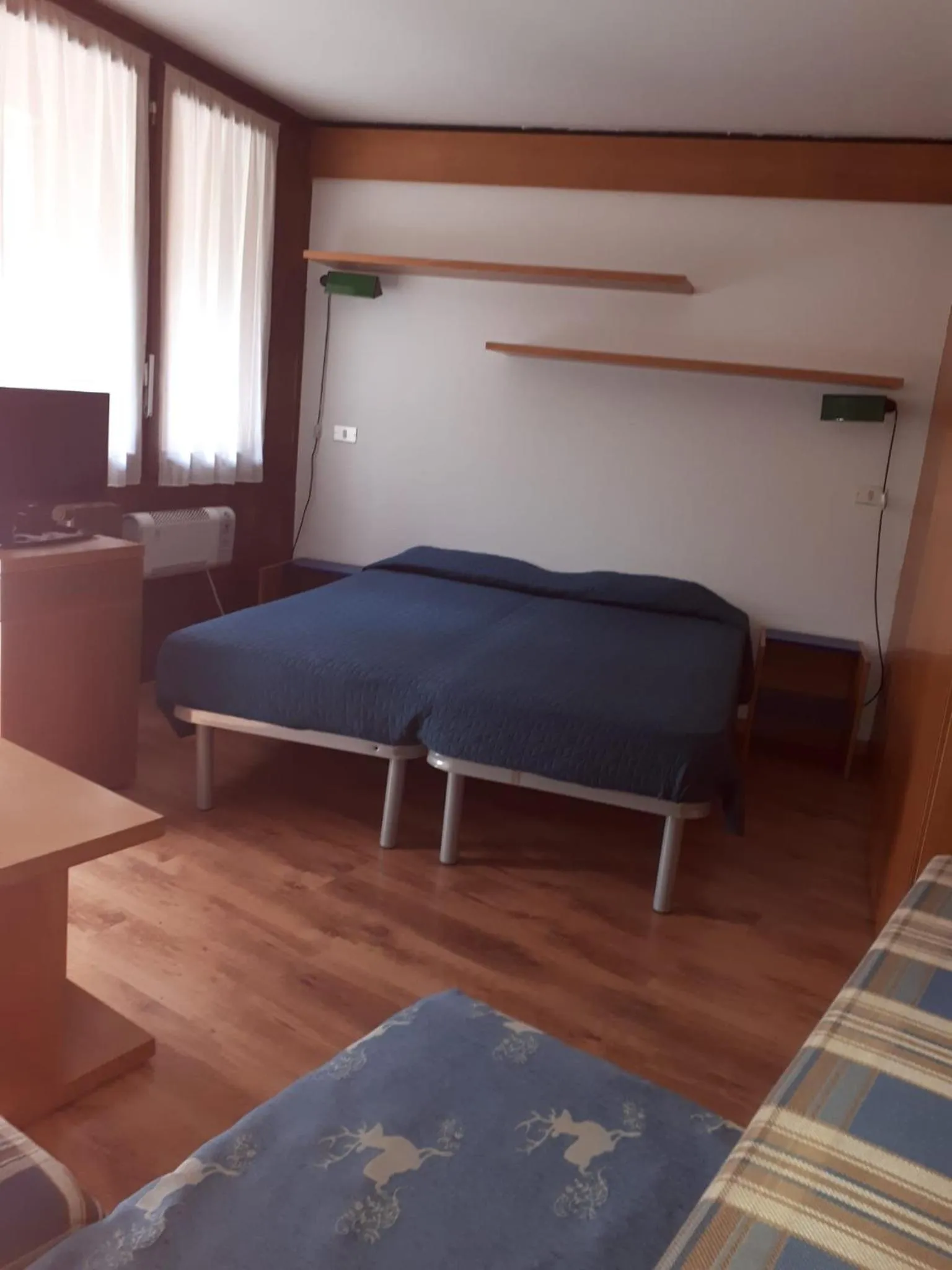 Bed in Appartamenti La Maison de Vacances