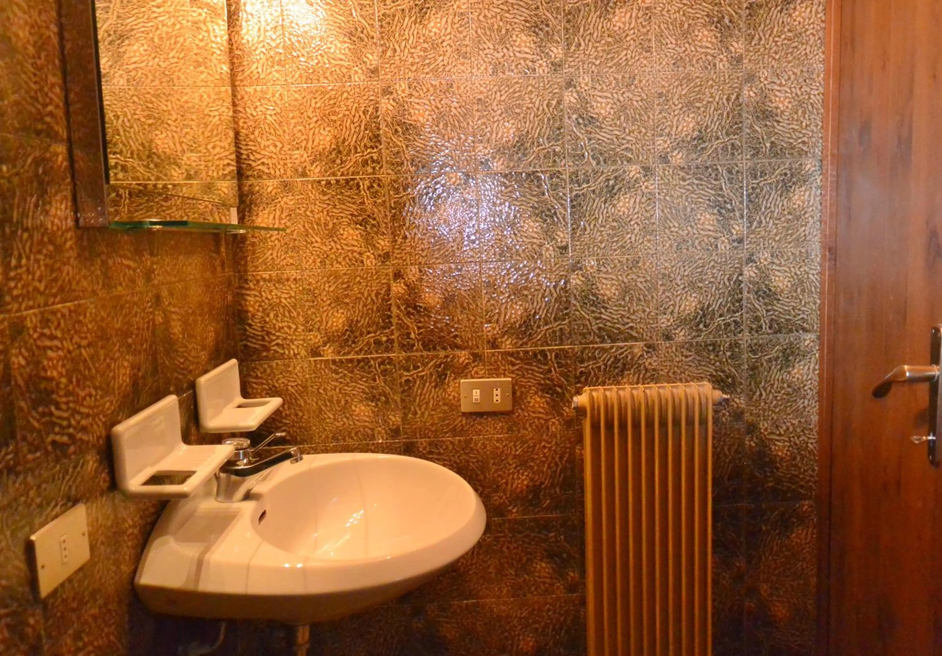 Bathroom in Appartamenti La Maison de Vacances