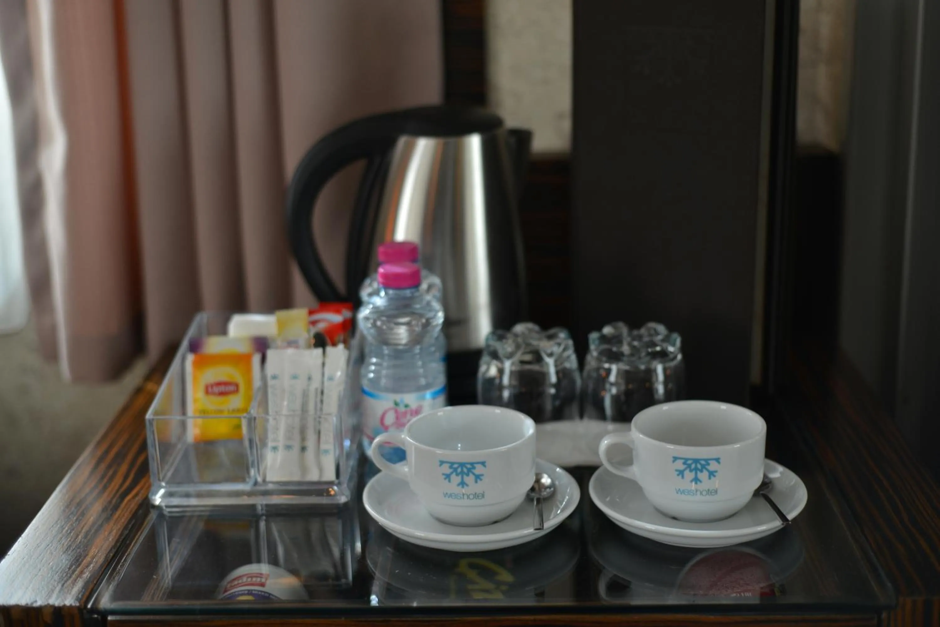 Property logo or sign in Wes Hotel