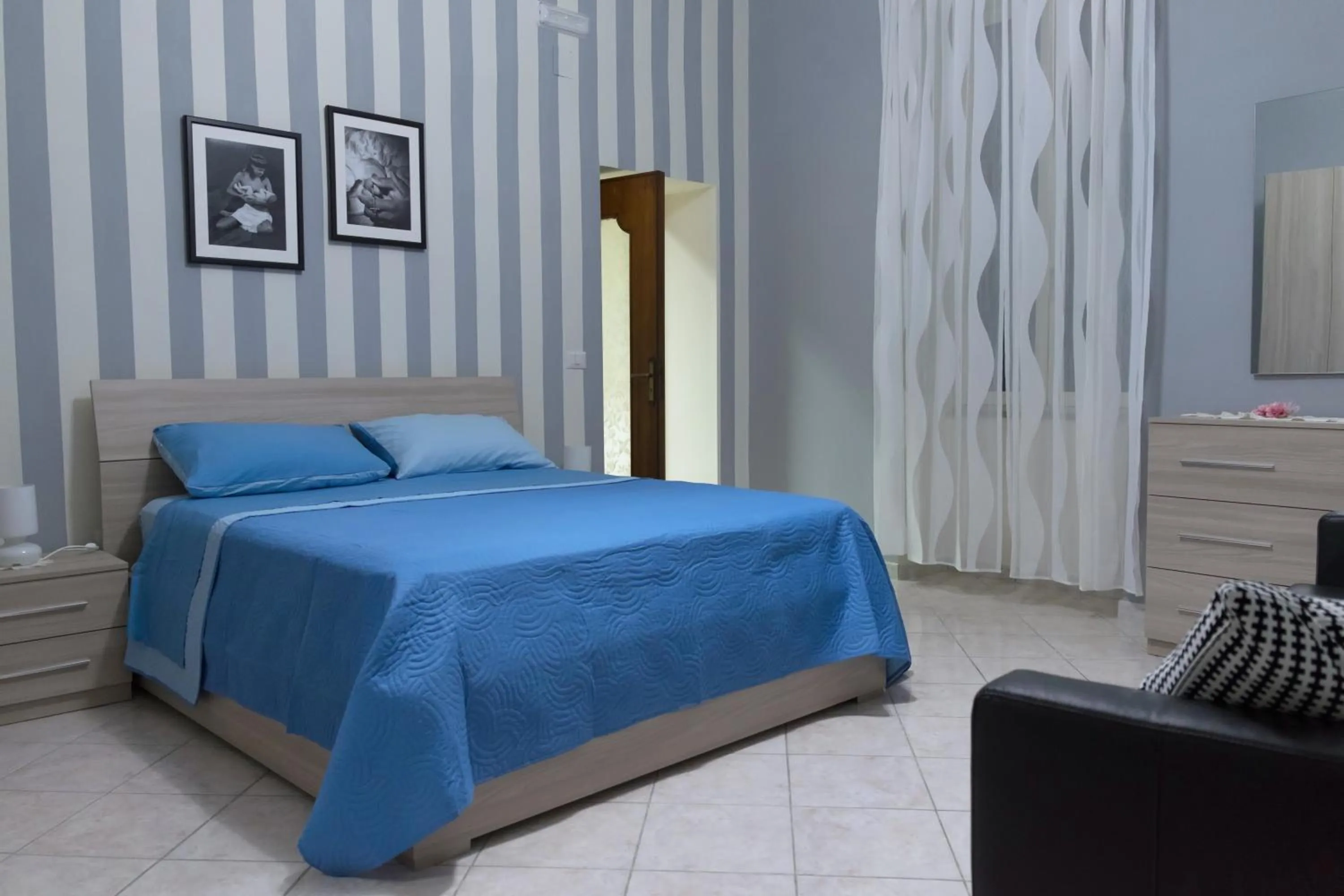 Photo of the whole room, Bed in Giualduomo B&B