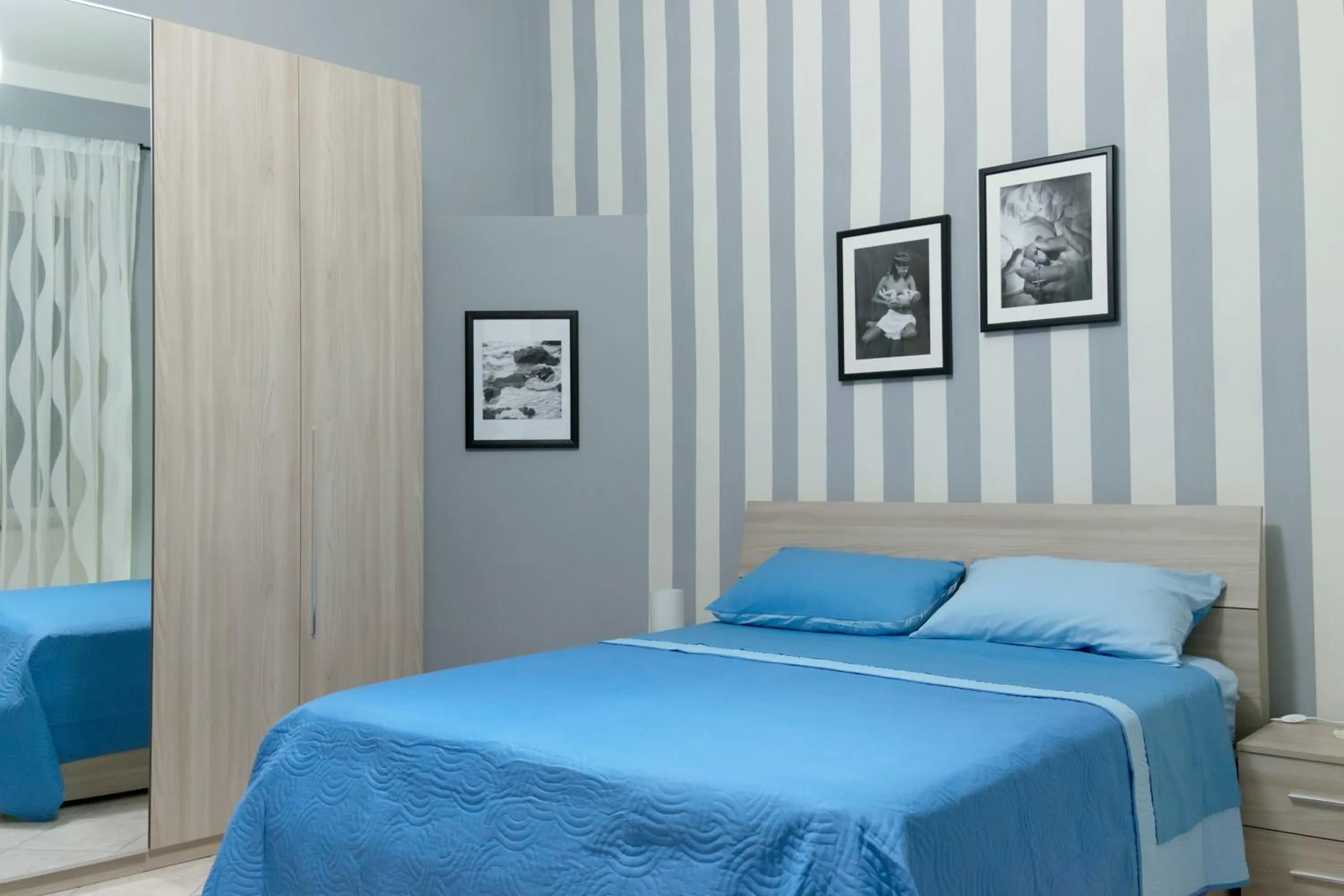 Decorative detail, Bed in Giualduomo B&B