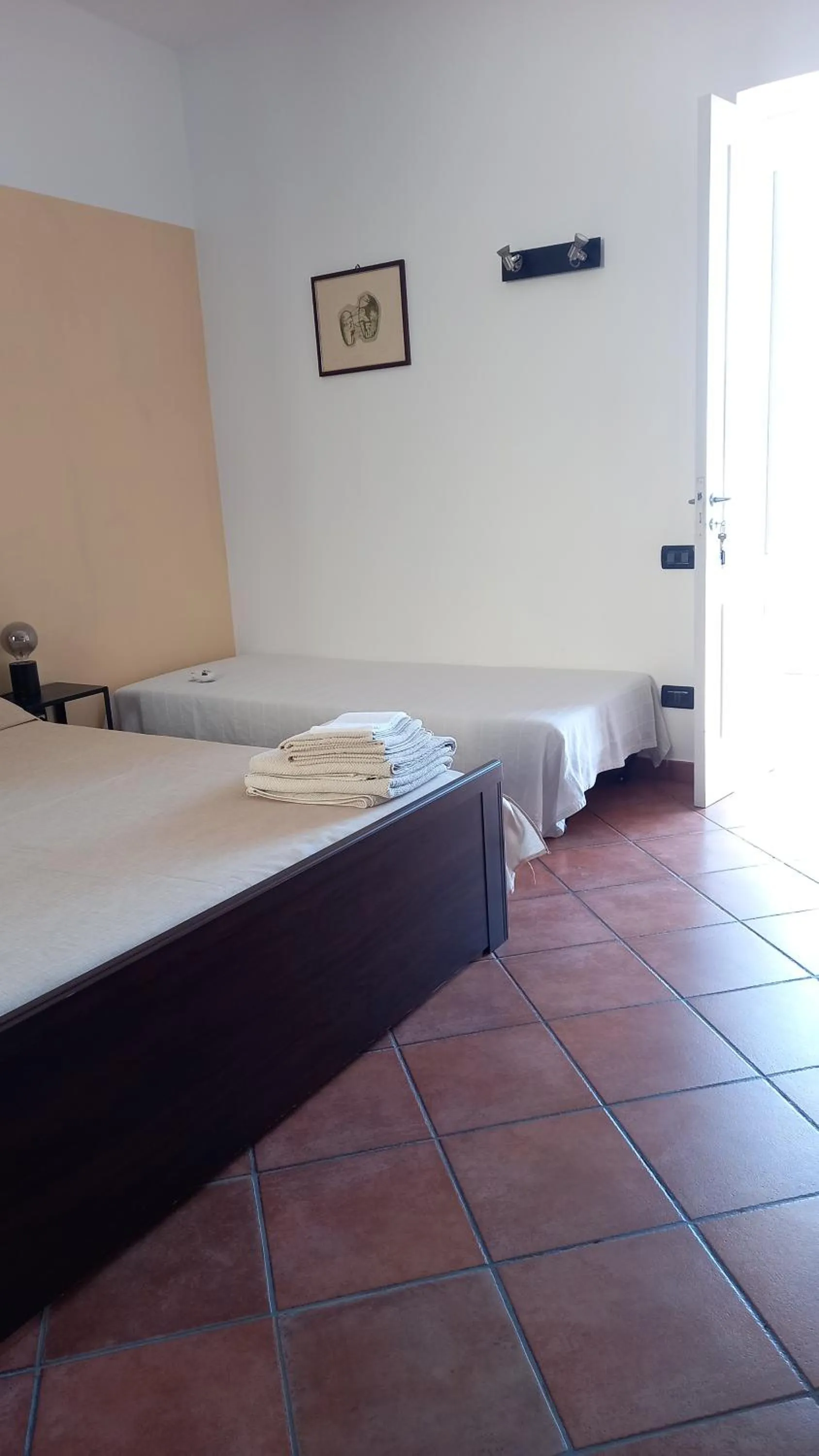 Photo of the whole room, Bed in La Casa Del Sole