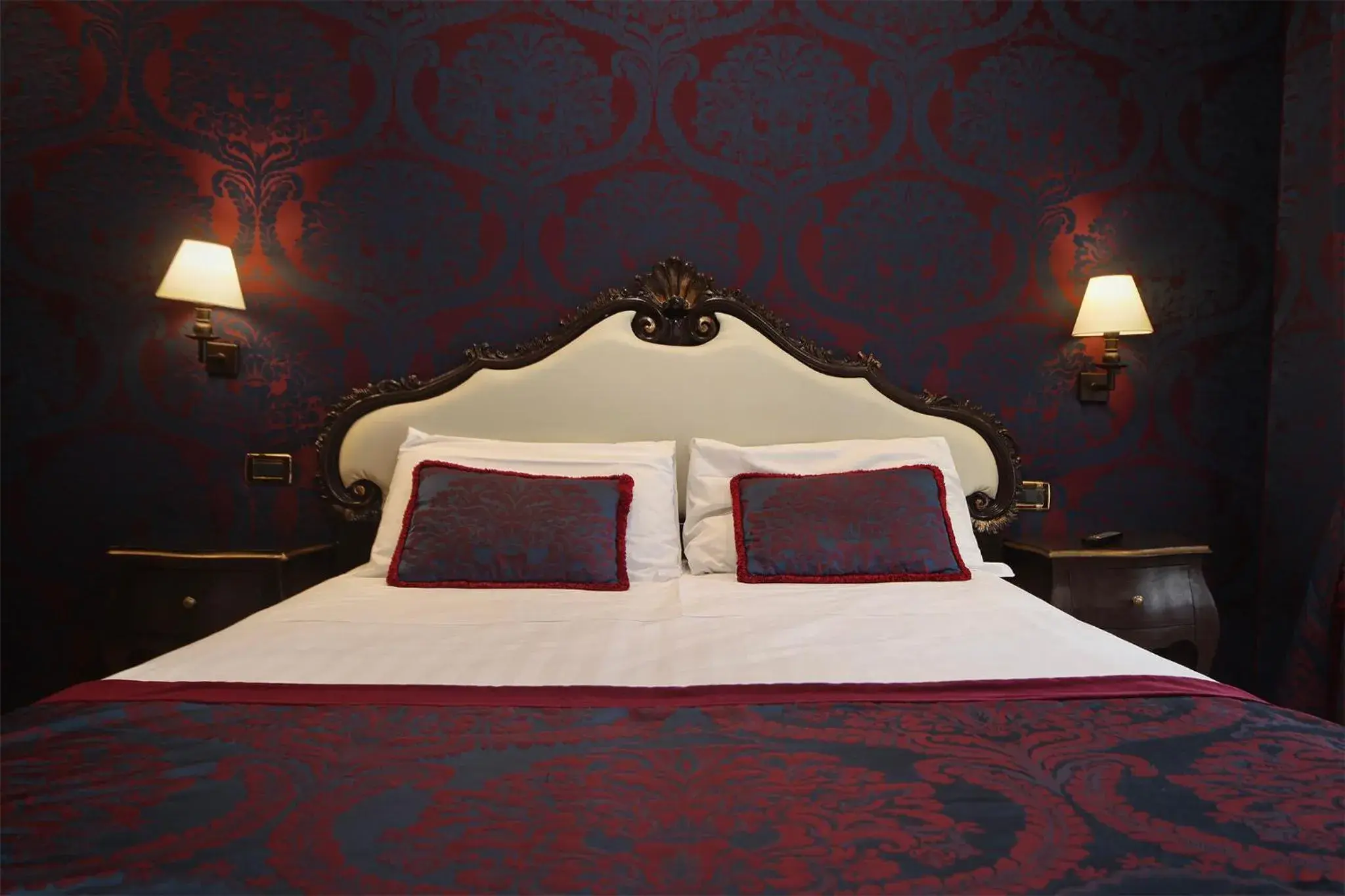 Decorative detail, Bed in Locanda Antica Venezia Decorative detail, Bed in Locanda Antica Venezia