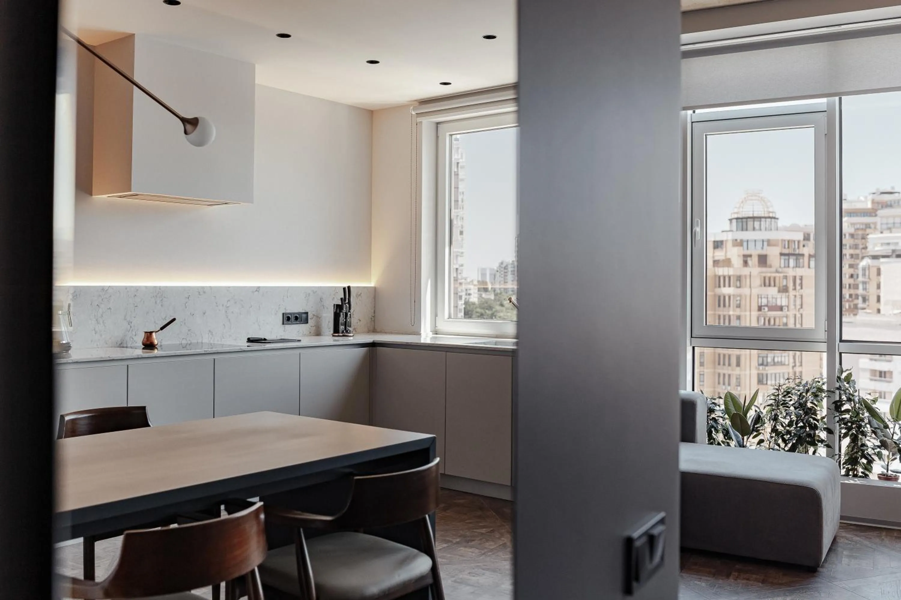 Kitchen or kitchenette in At Home Apartment