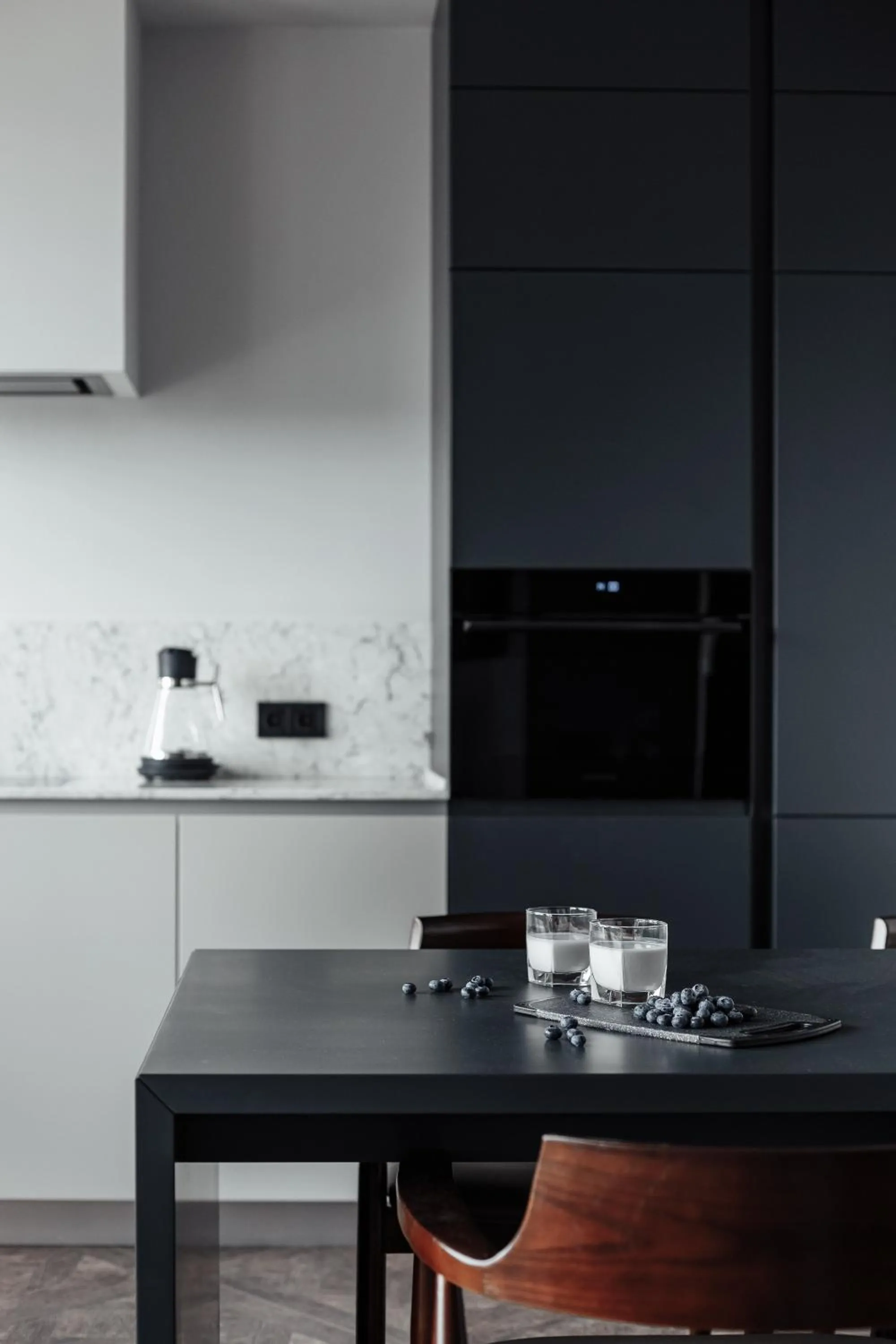 Kitchen or kitchenette in At Home Apartment