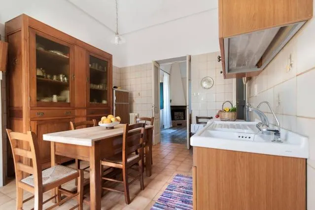 Kitchen or kitchenette in Il Giardino casa vacanze