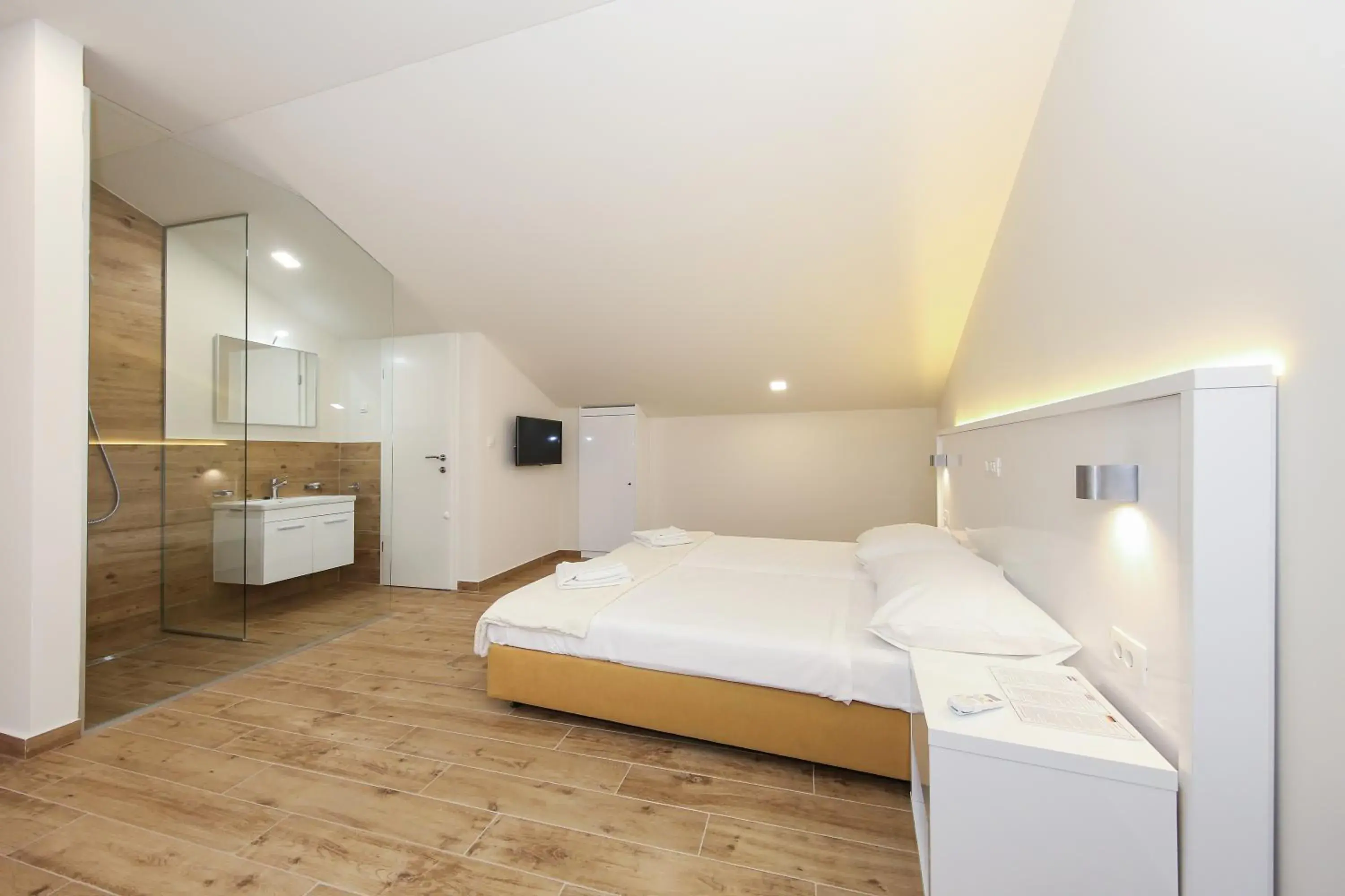 Double Room with two Extra Beds in Idassa Atrium rooms Double Room with two Extra Beds in Idassa Atrium rooms