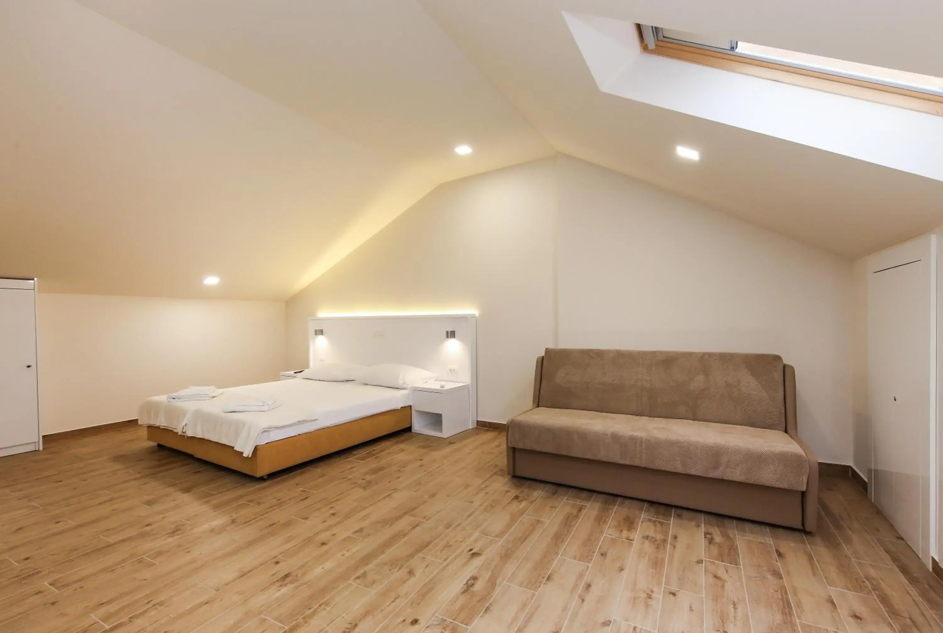 Double Room with two Extra Beds in Idassa Atrium rooms Double Room with two Extra Beds in Idassa Atrium rooms