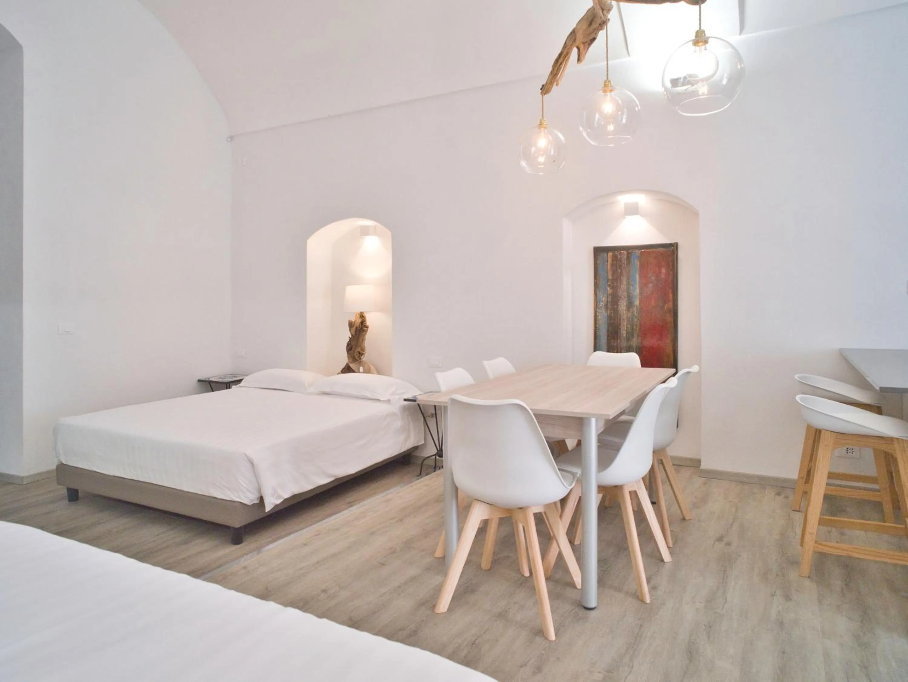 Dining area, Bed in Hotel Medusa