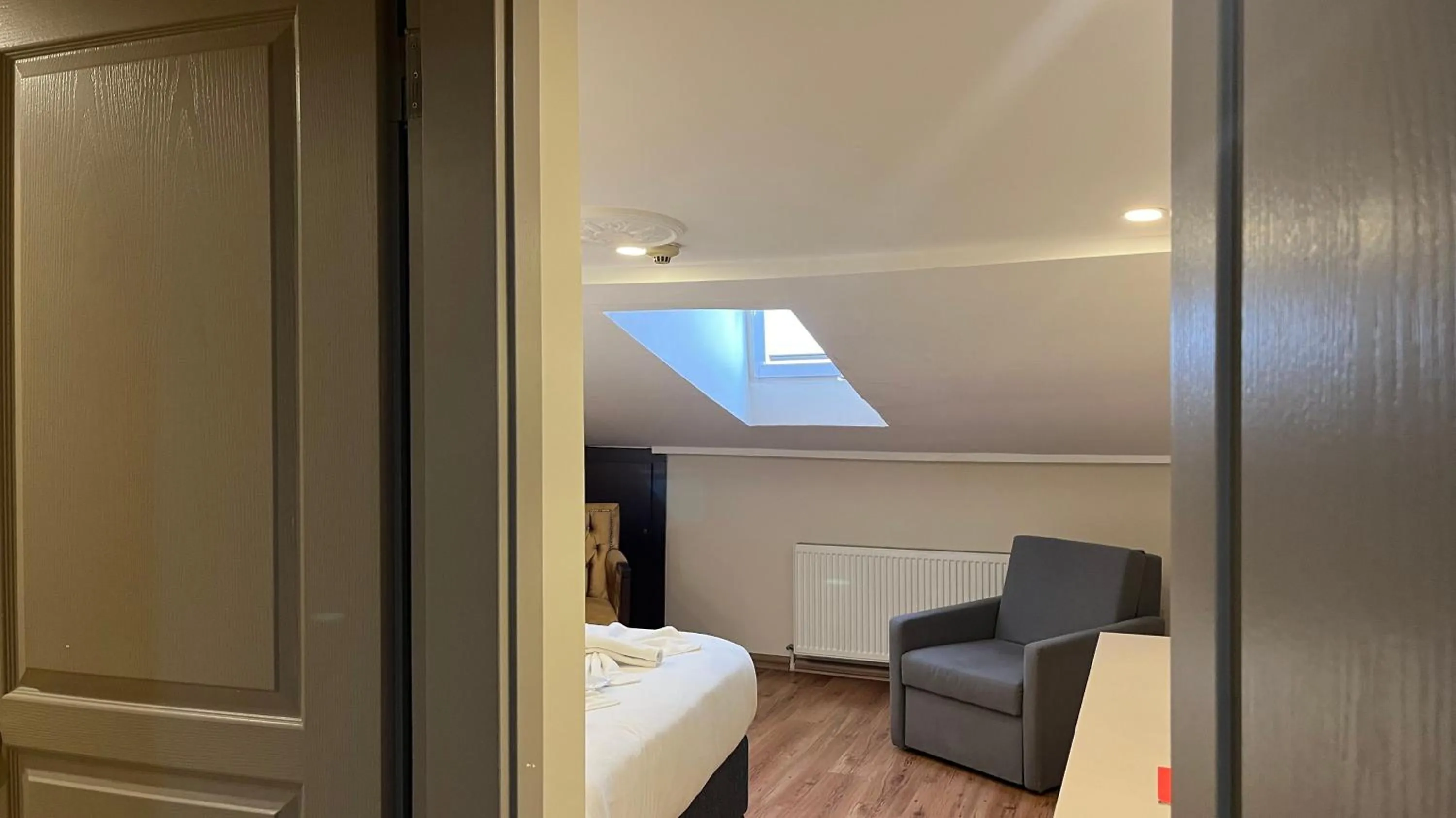 Bed in Hotel Tulip House