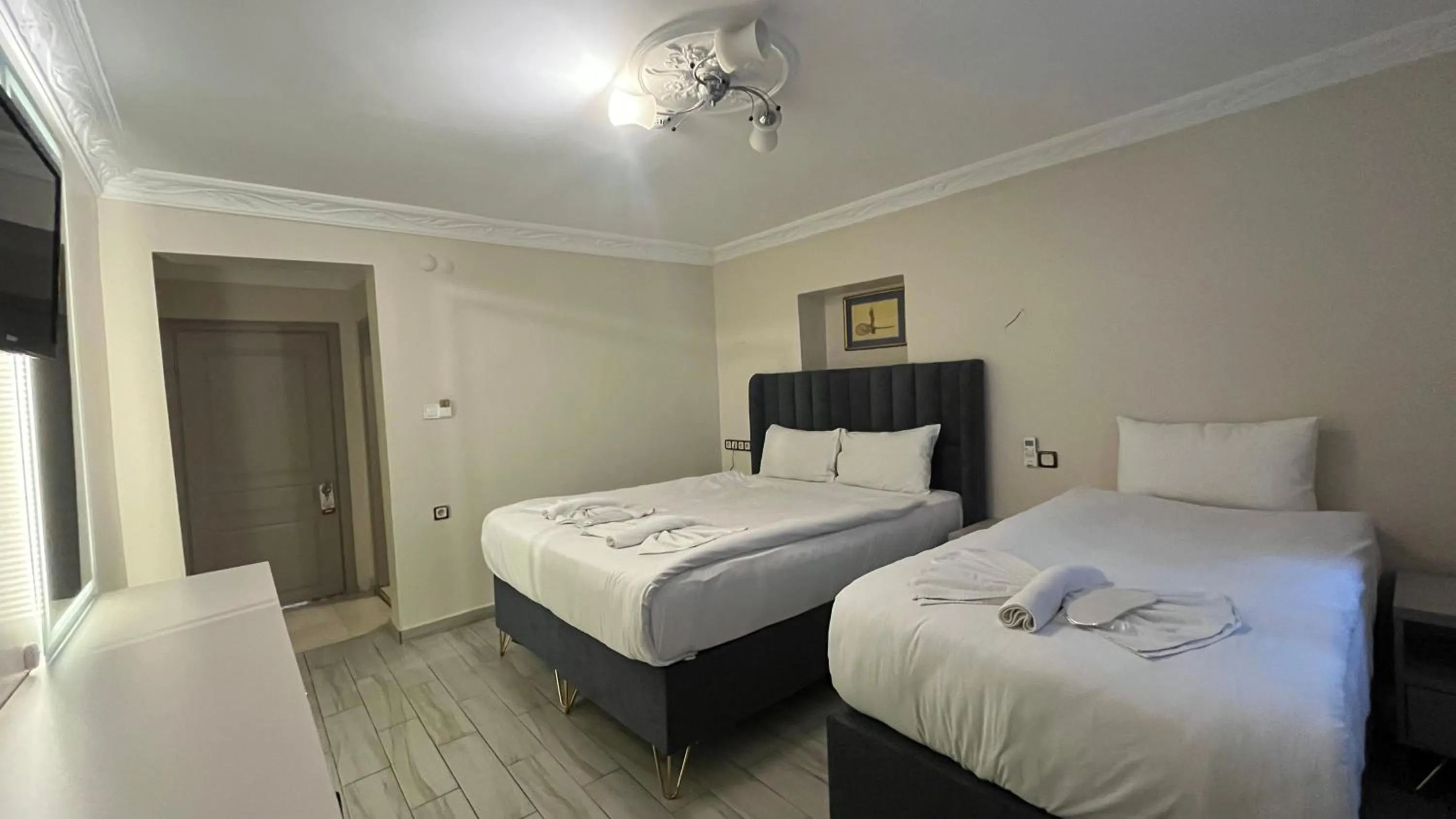 Bed in Hotel Tulip House