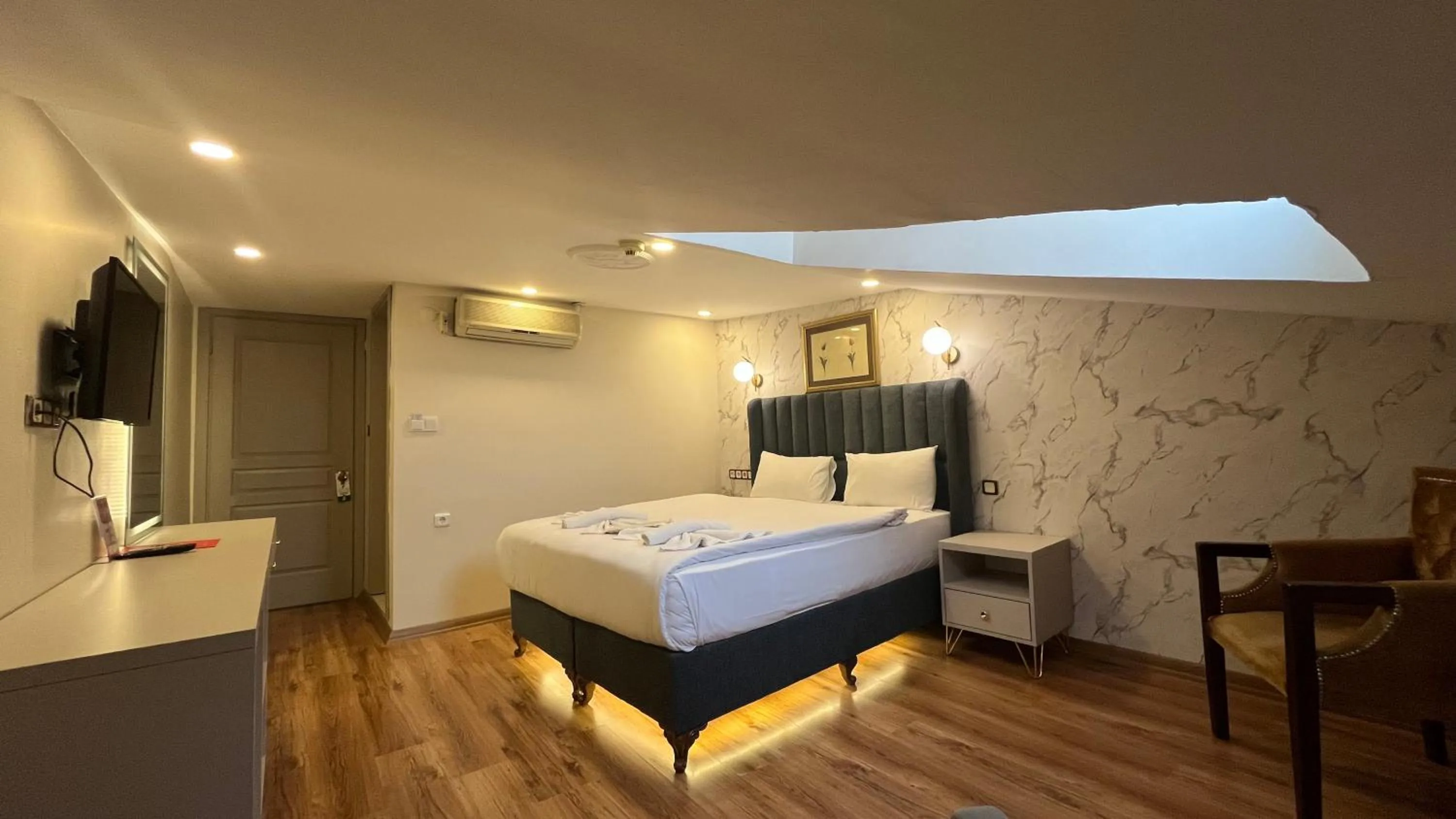 Bed in Hotel Tulip House