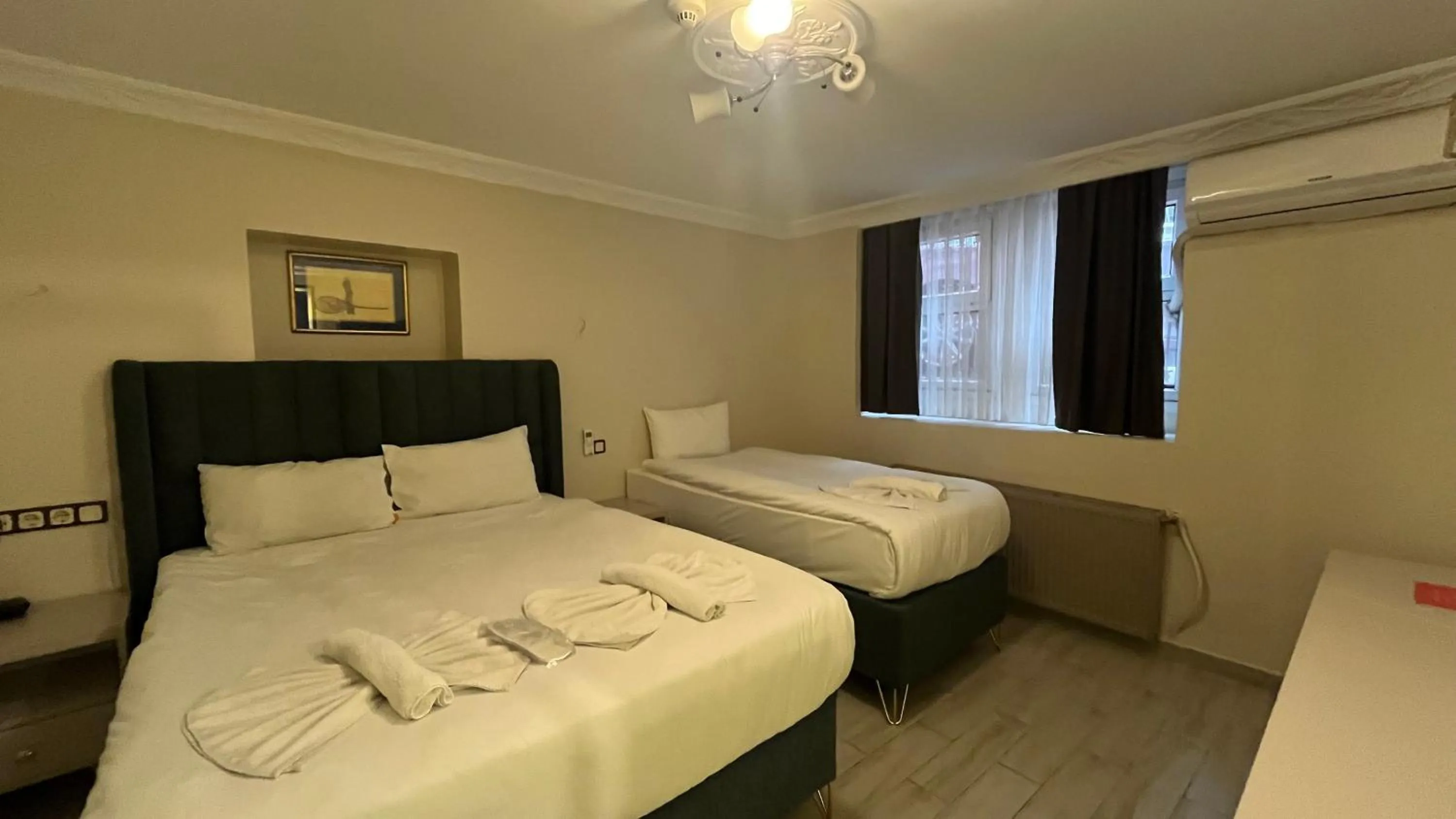 Bed in Hotel Tulip House