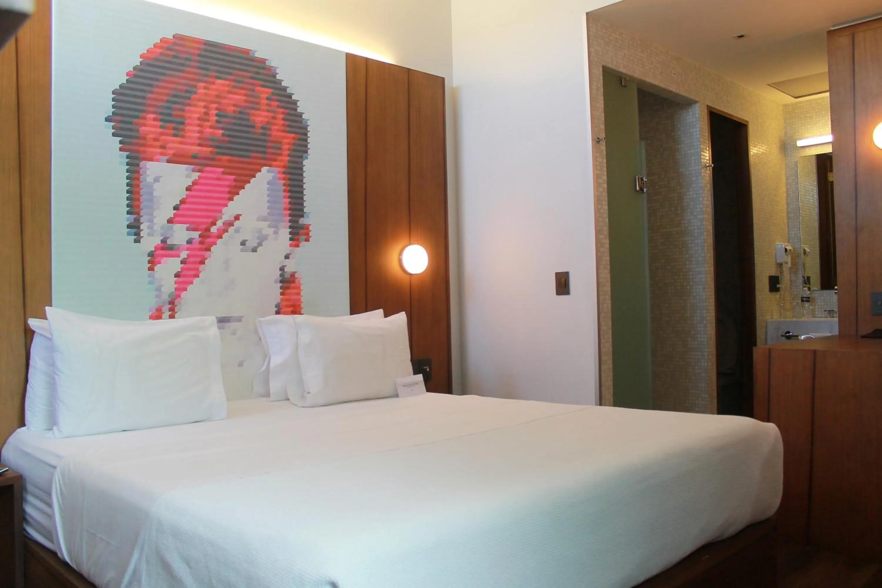 Photo of the whole room, Bed in Ikonik Hotel Puebla