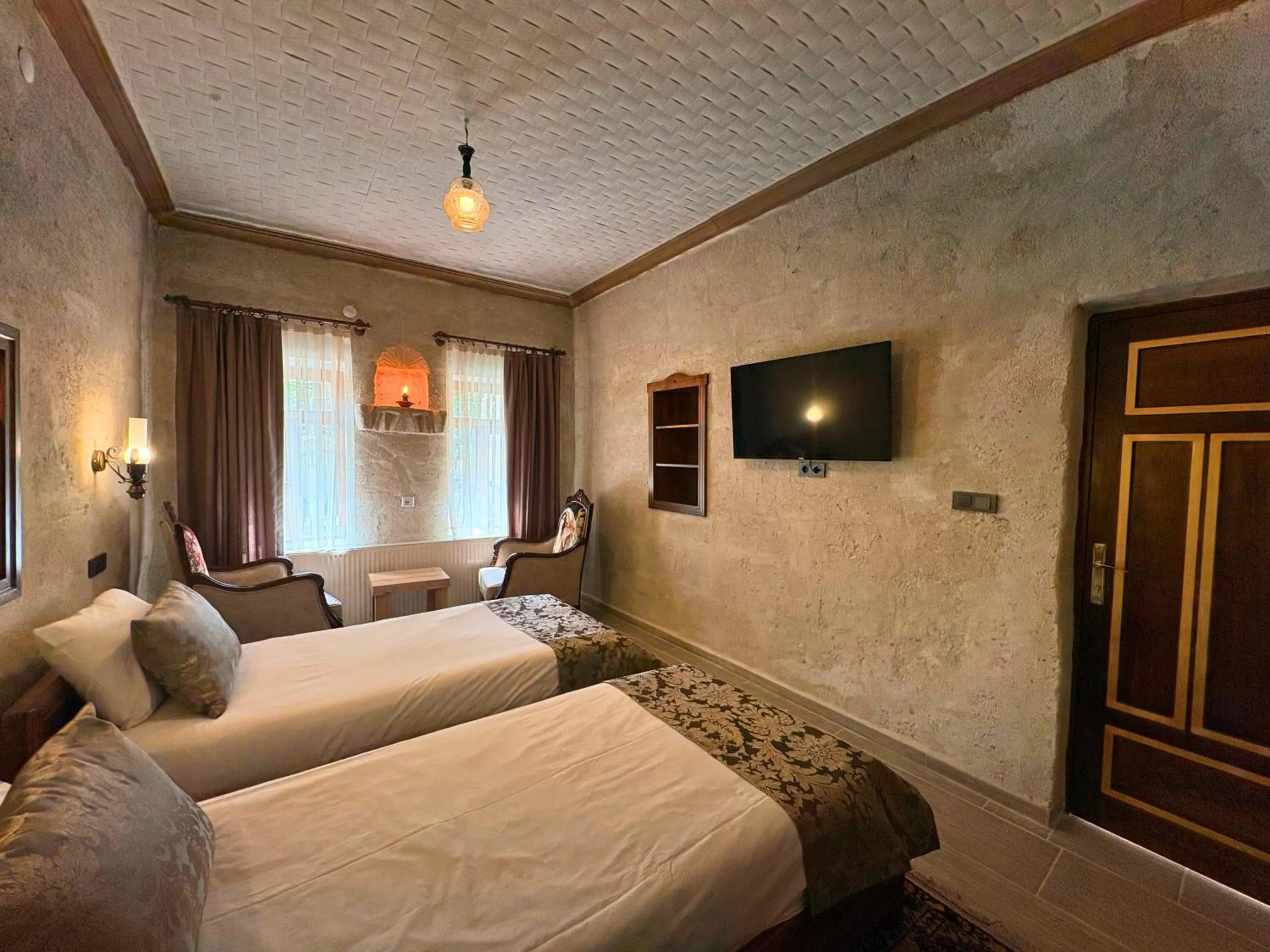 Bed in Elysee Cave House