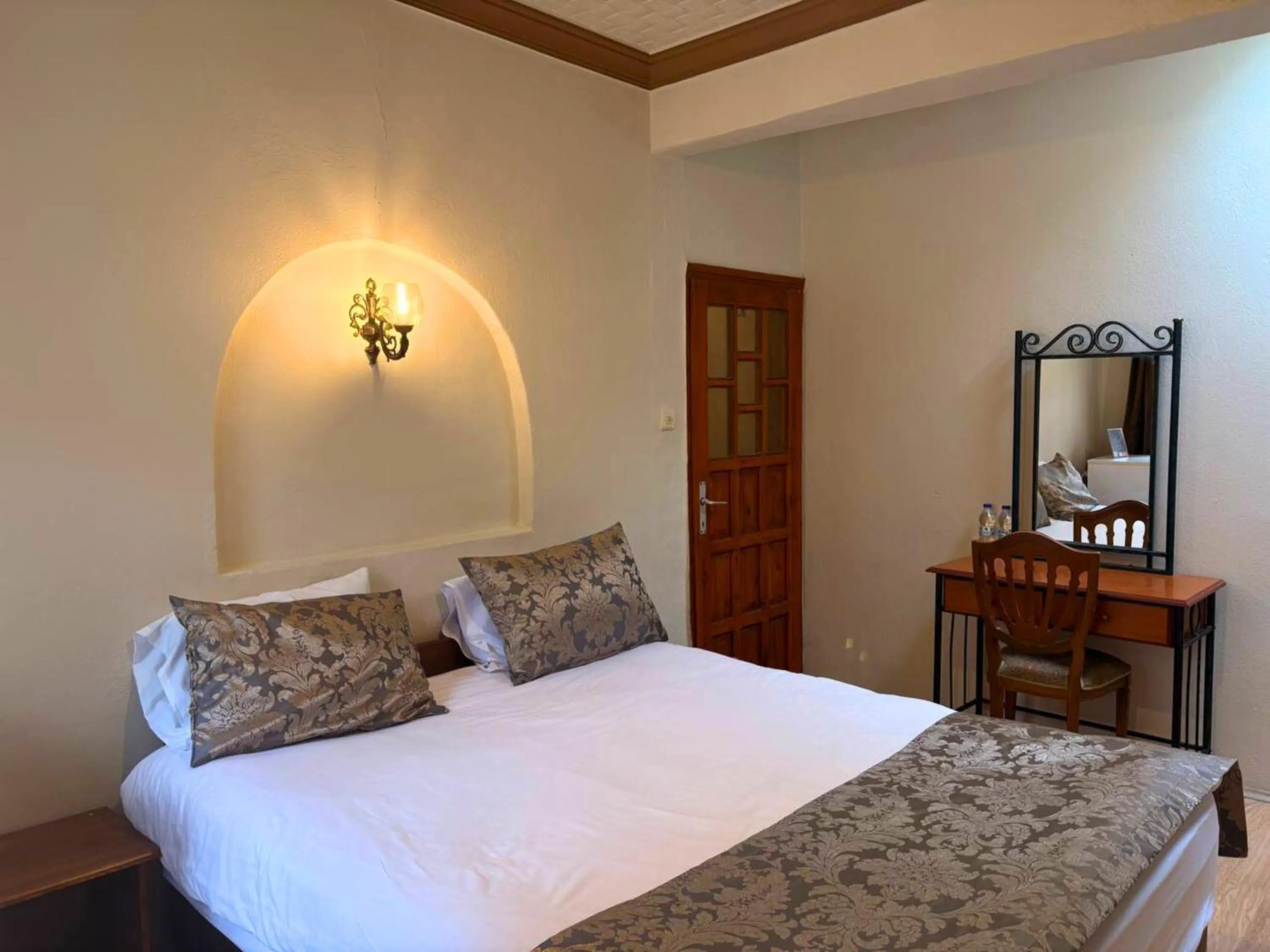 Bed in Elysee Cave House