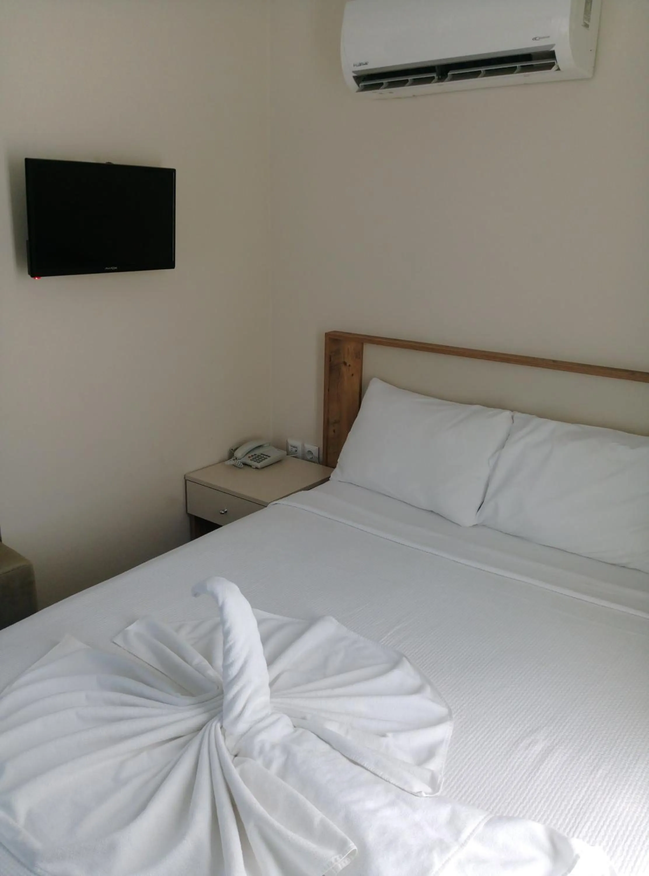 Bed in Rich Melissa Hotel