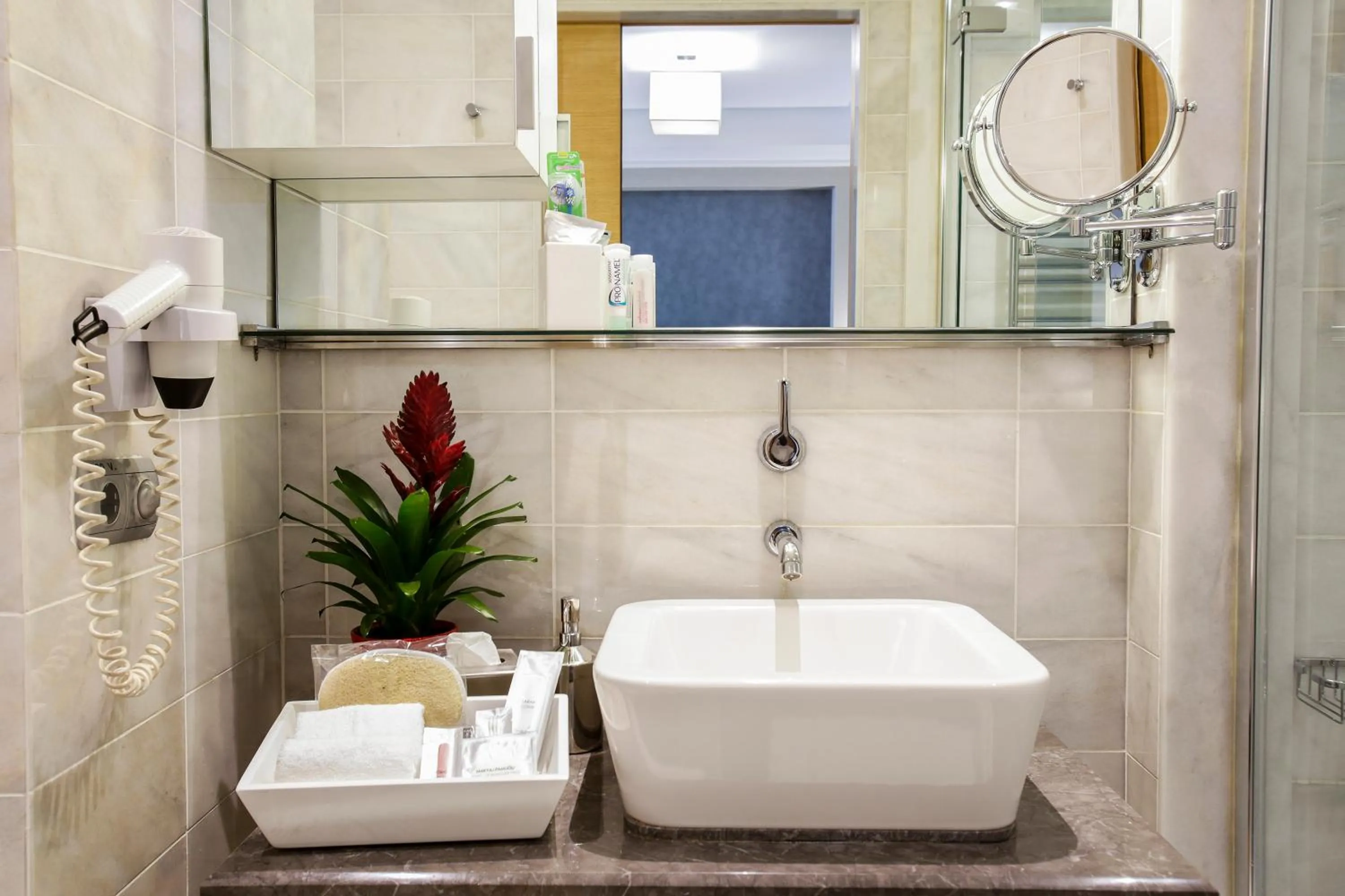 Bathroom in Housez Suites & Apartments Special Class