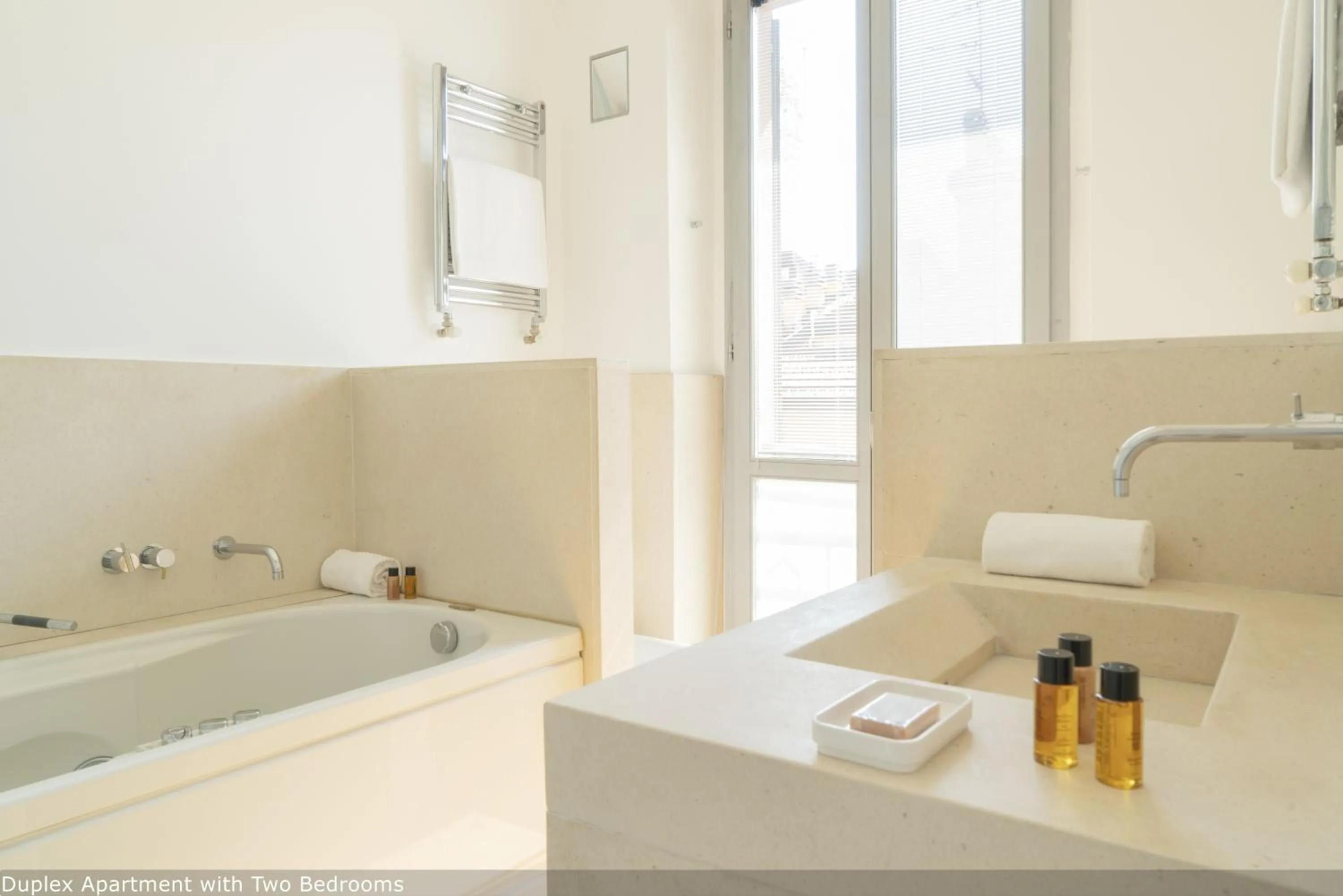 Bed in Brera Apartments in San Fermo