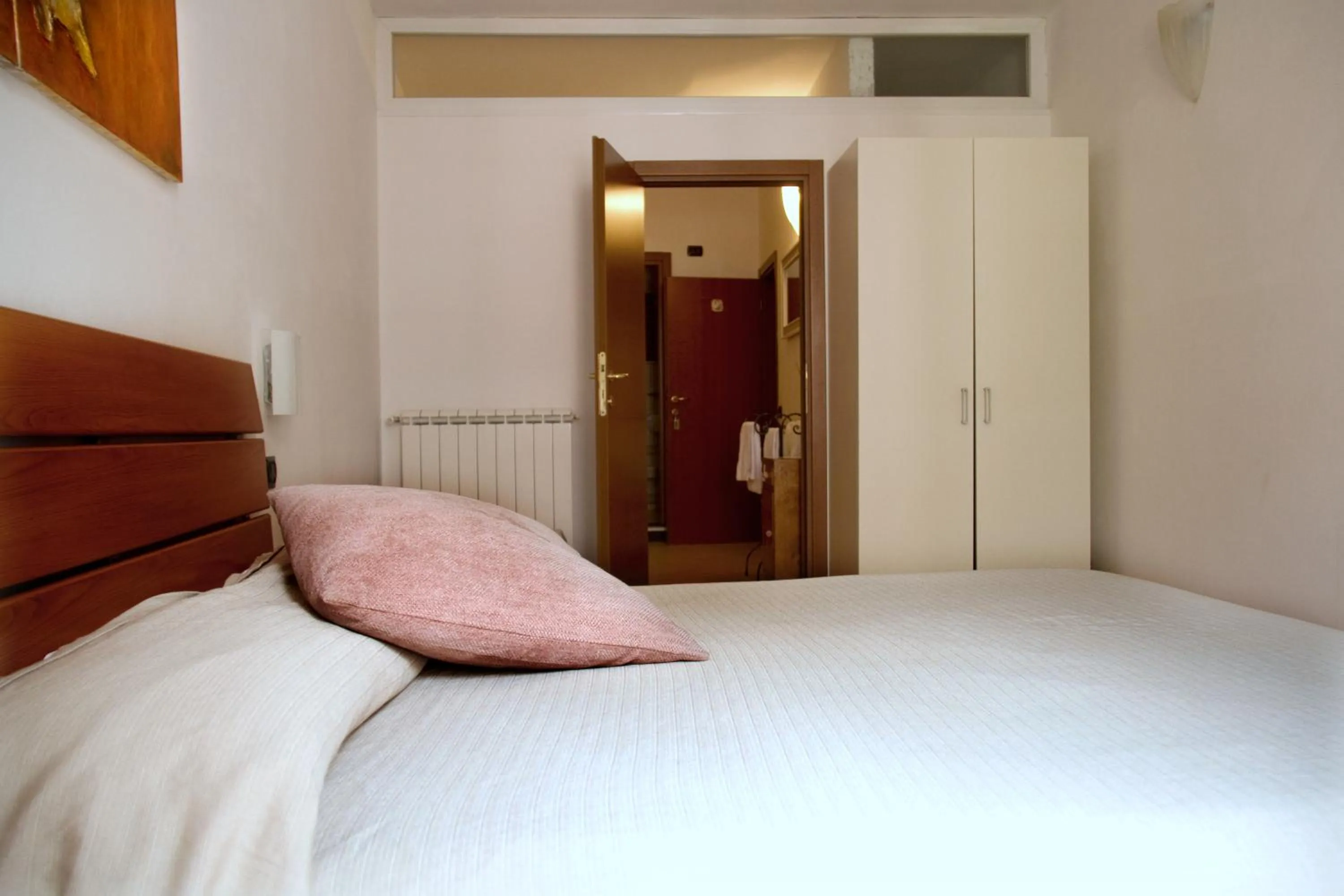 Bed in Affittacamere Rollando