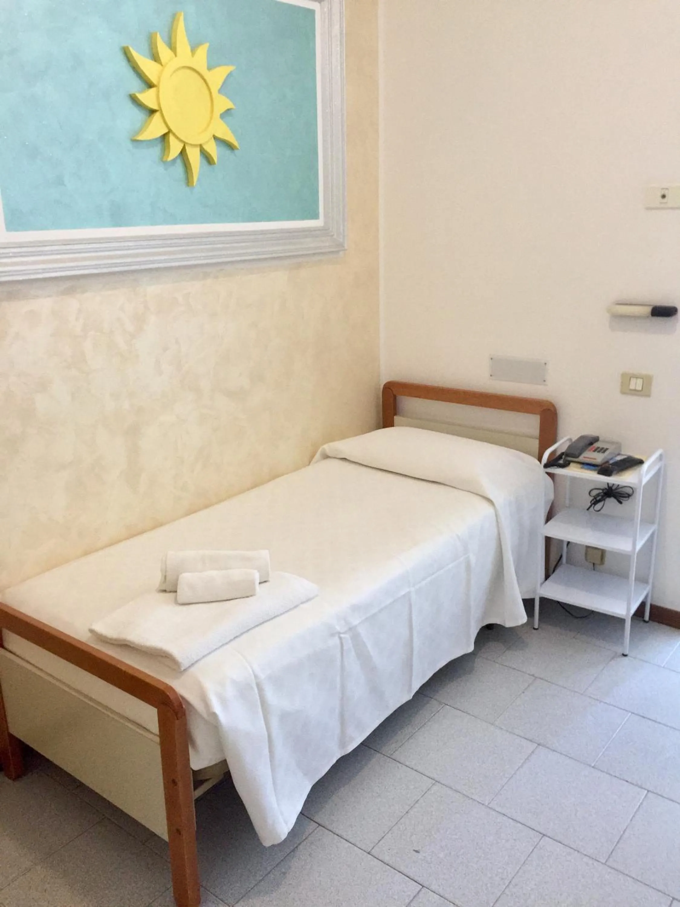 Bed in Hotel De Amicis