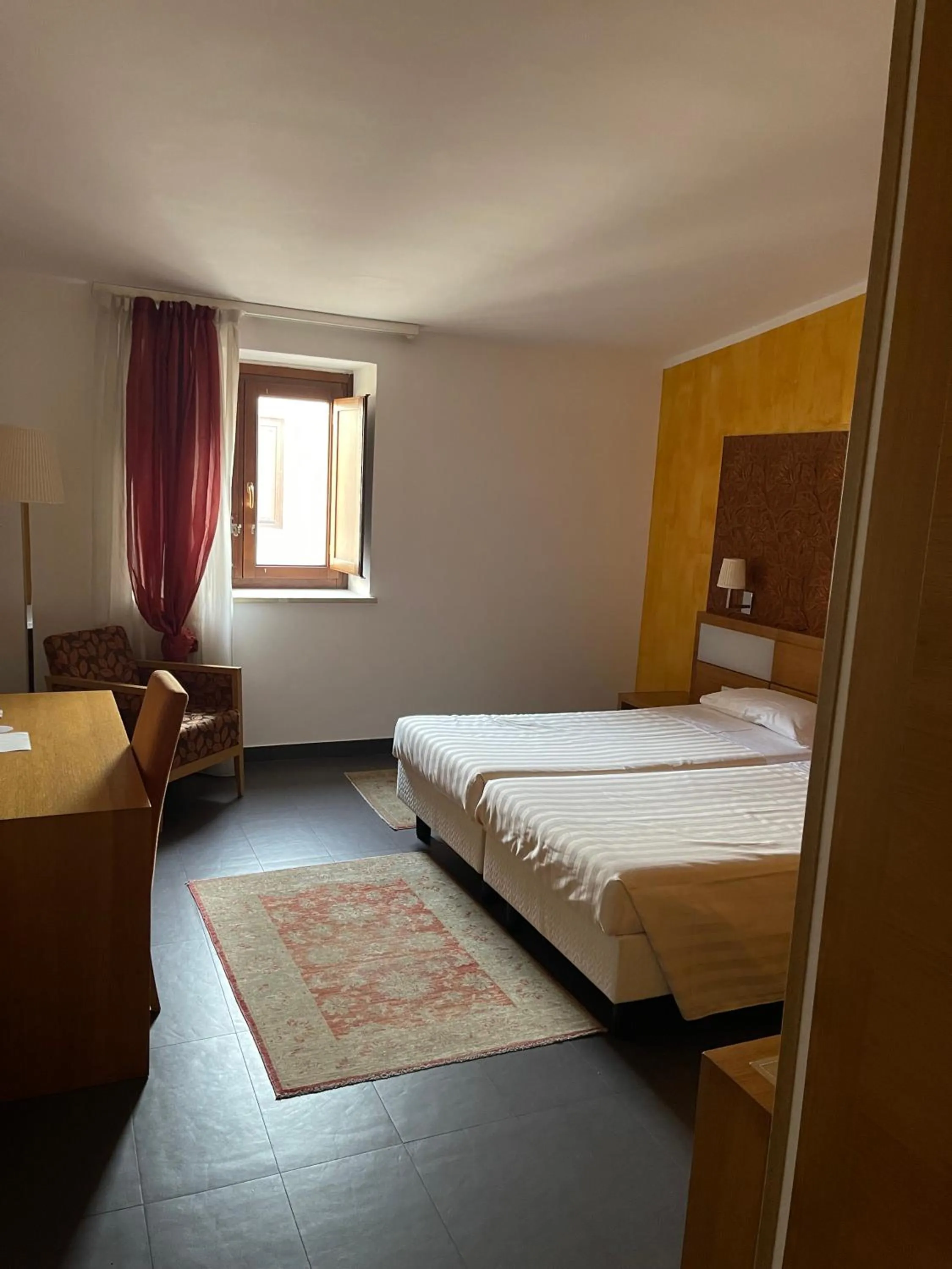 Photo of the whole room, Bed in Grande Albergo Alfeo