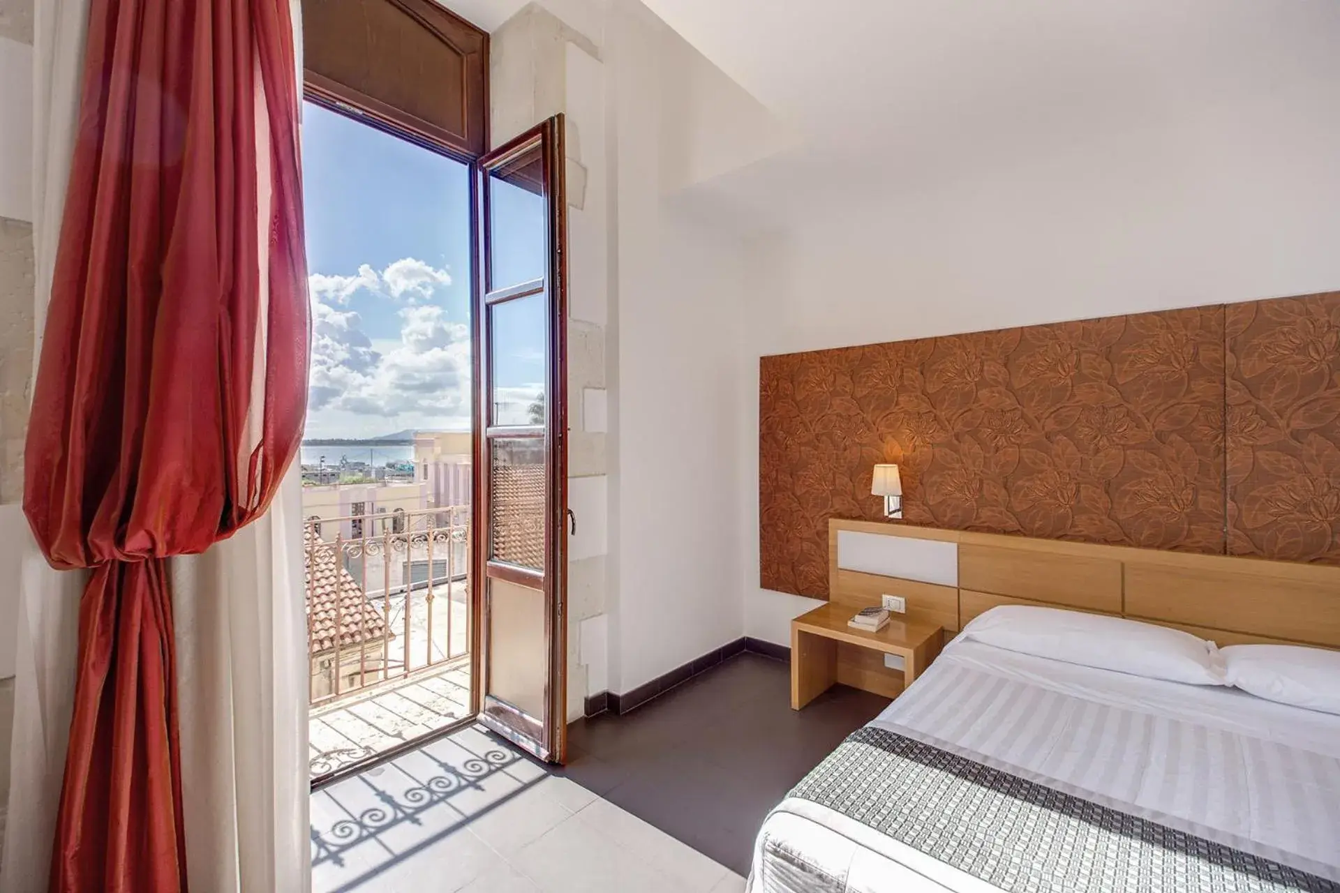 City view, Bed in Grande Albergo Alfeo City view, Bed in Grande Albergo Alfeo